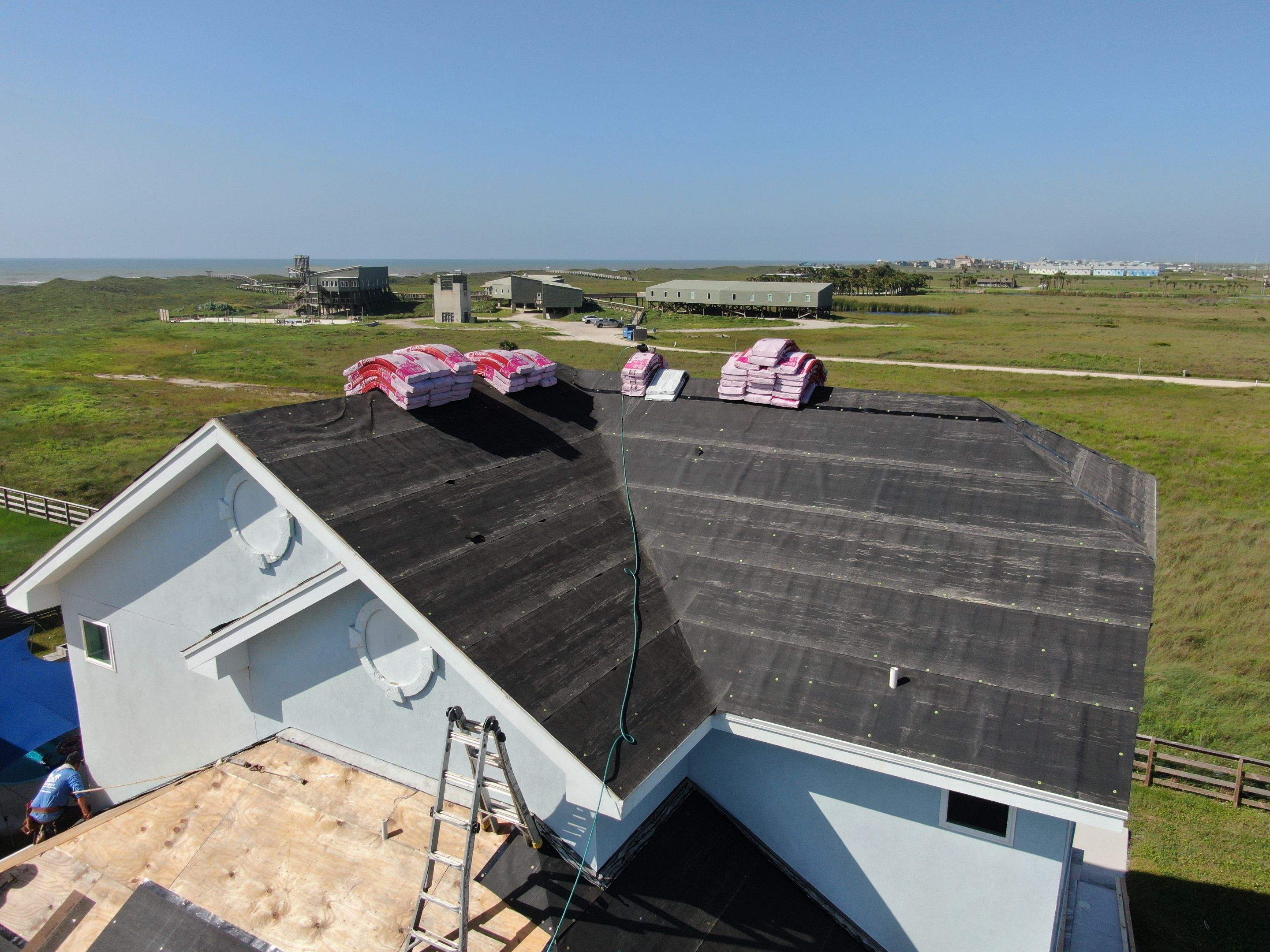 We Aint Scared of heights  by Bayfront Roofing and Construction