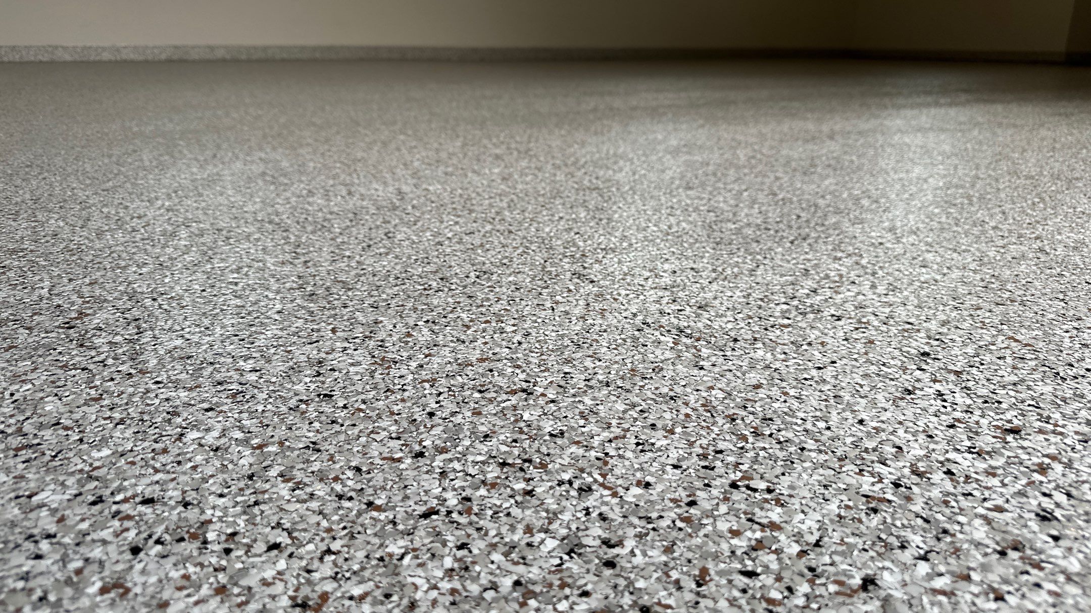 Coyote floors make a huge difference. Look!! by Banner Garage
