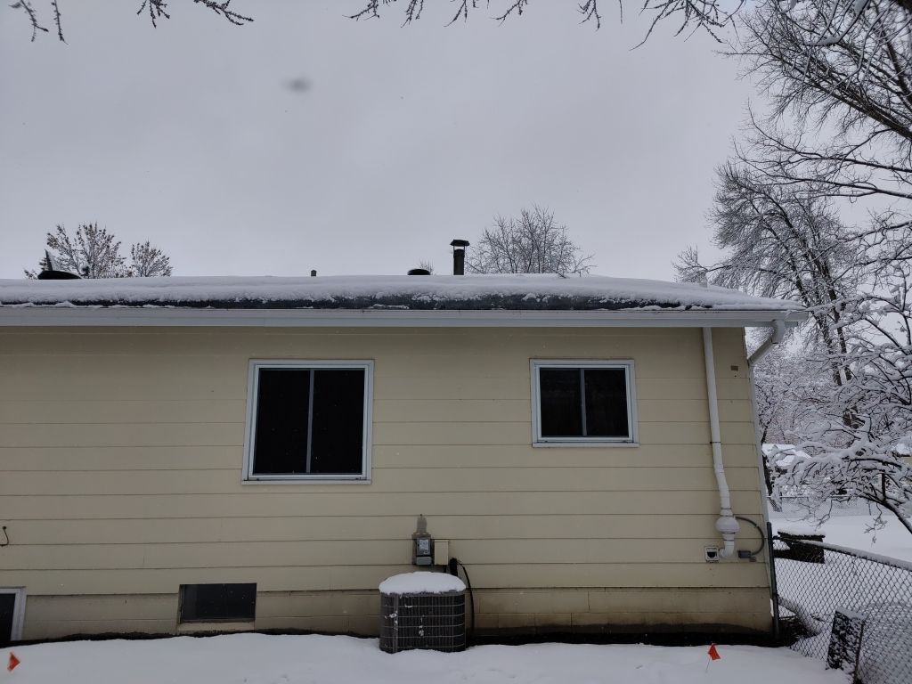 Ice Dam Steaming in Maple Grove by Next Level Seamless Gutters / Exteriors Inc.