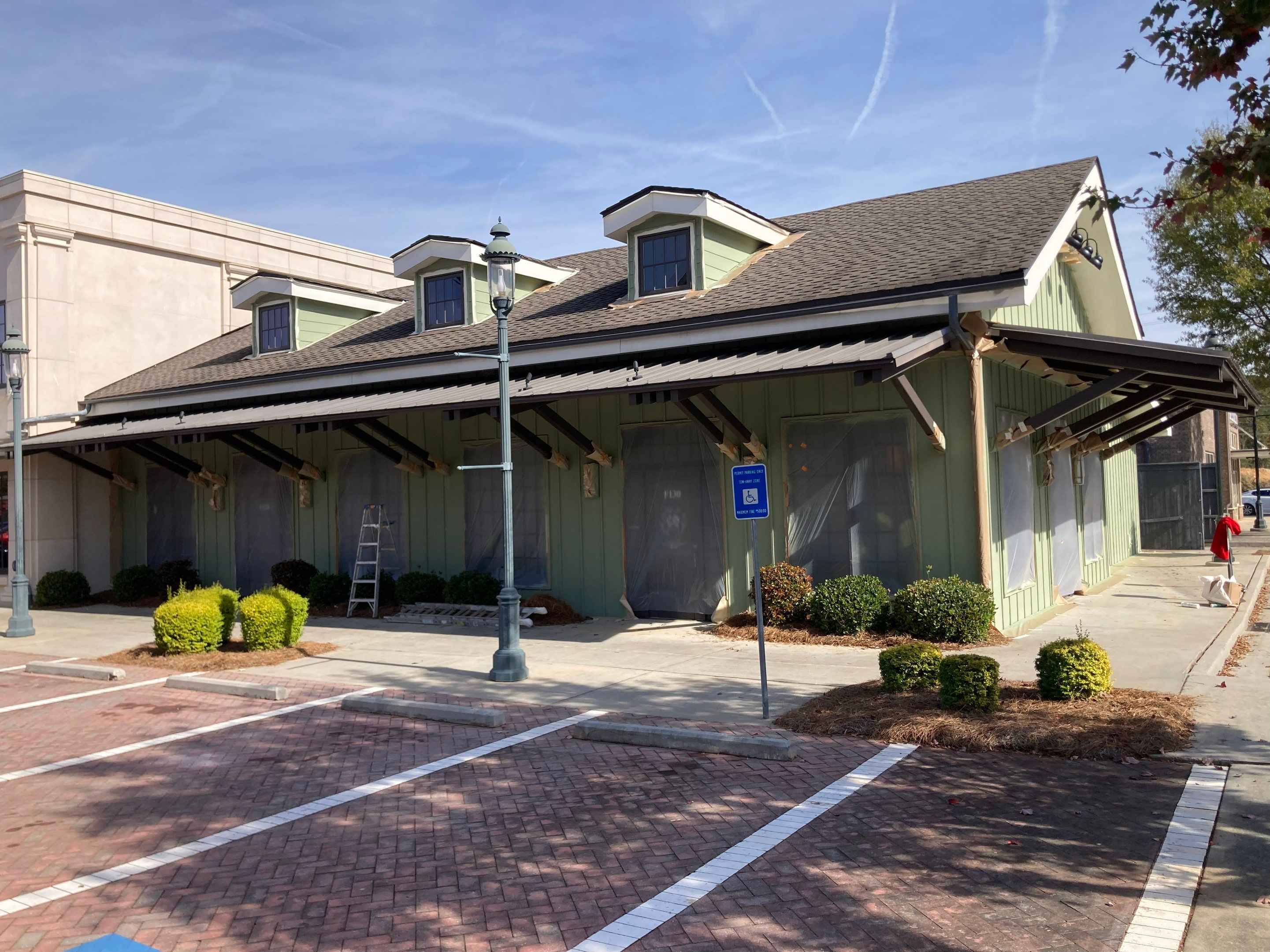 Commercial Exterior & Stairwell Painting – Corner Market by Praise God Painting, LLC