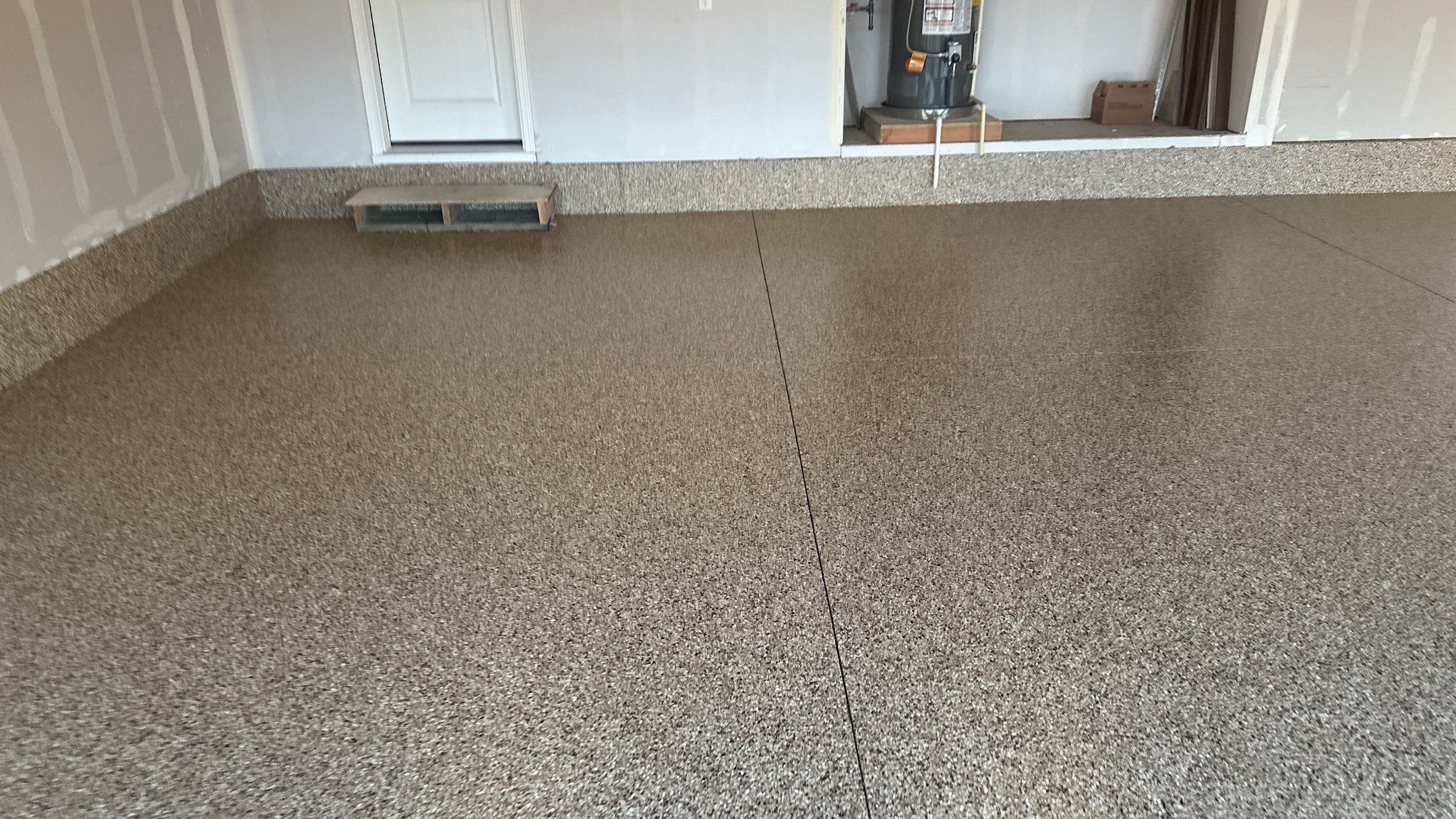 Garage Transformation using Sandstone by Croc Coatings, LLC