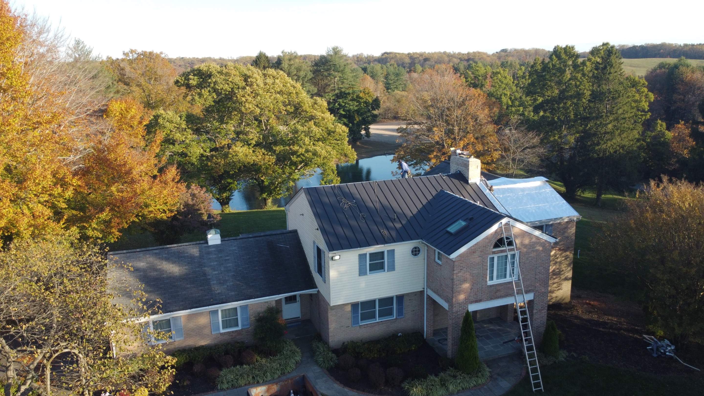 Residential Roofing Installation using Standing Seam Metal Roof | Mechanically Fastened | 24 Gauge by Matter Roofing & Construction