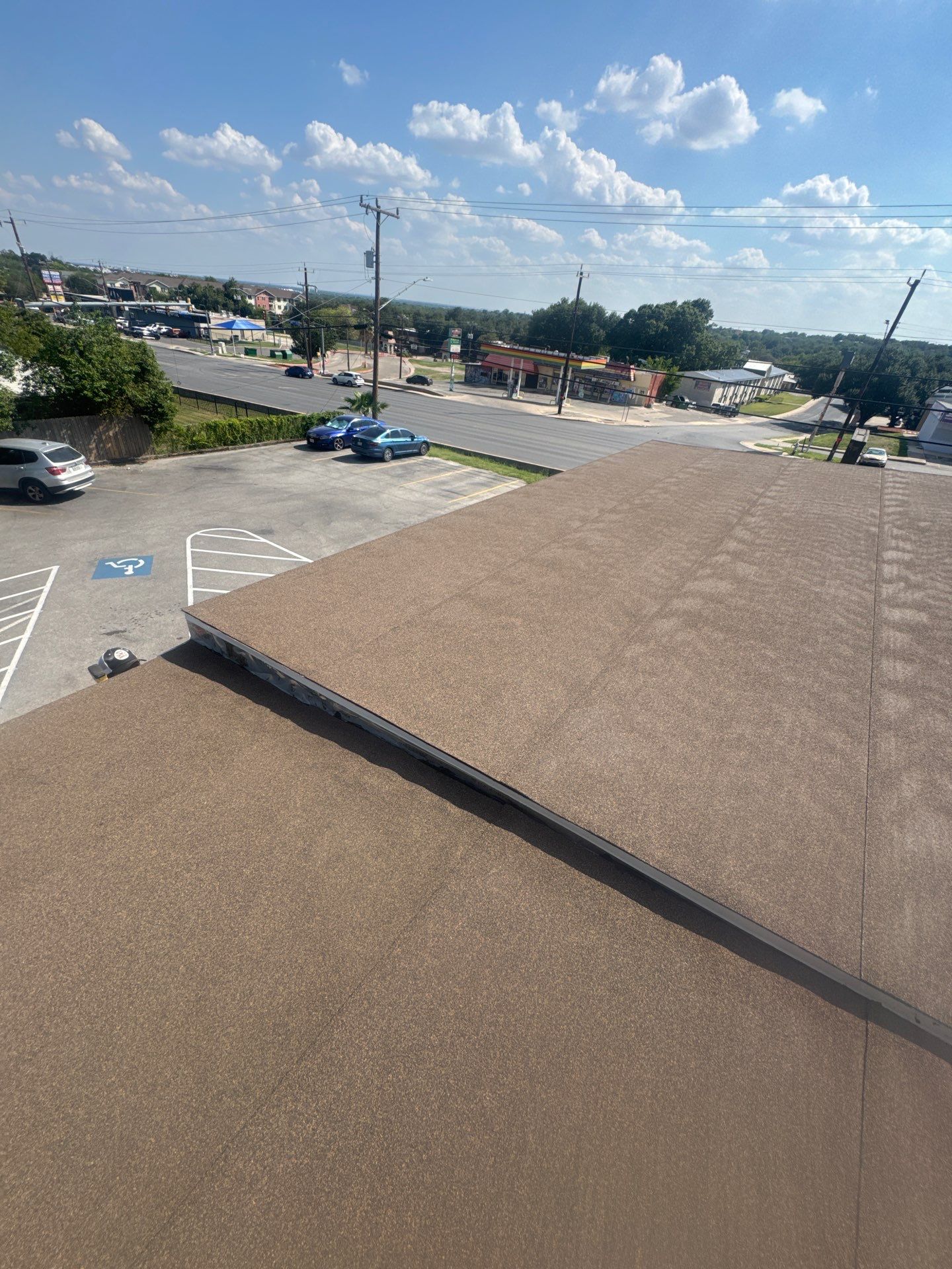 Commercial Replacement using Mulehide SA Base and Cap Sheet by Cool Roofs