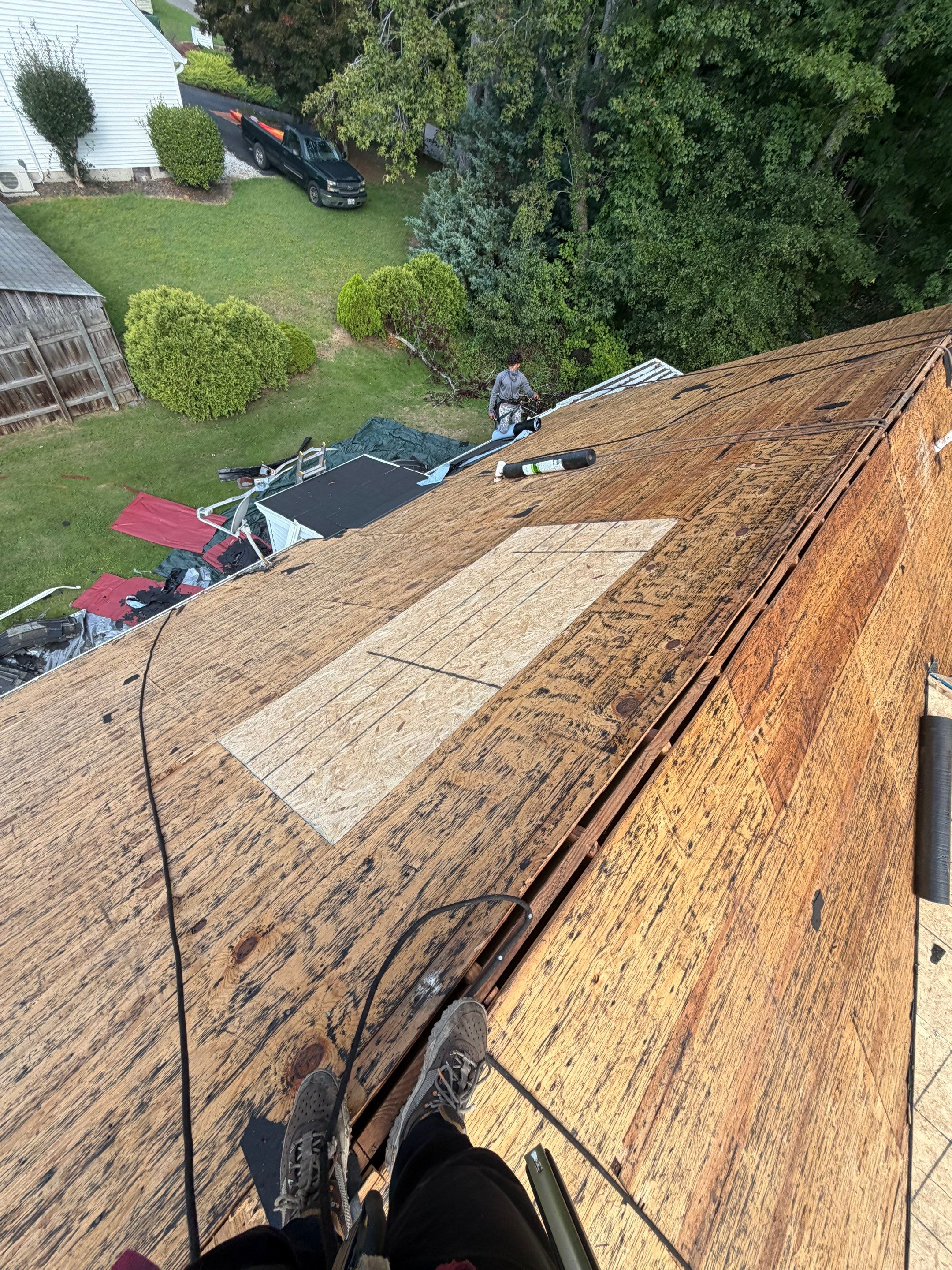 Asphalt Shingle Roof Replacement and Custom Porch Renovation in Hayes by Cade Construction
