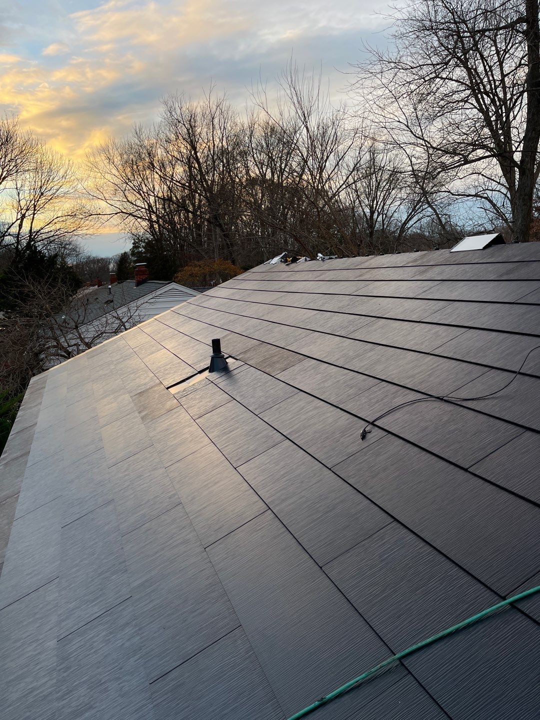 Tesla Solar Glass by American Home Contractors
