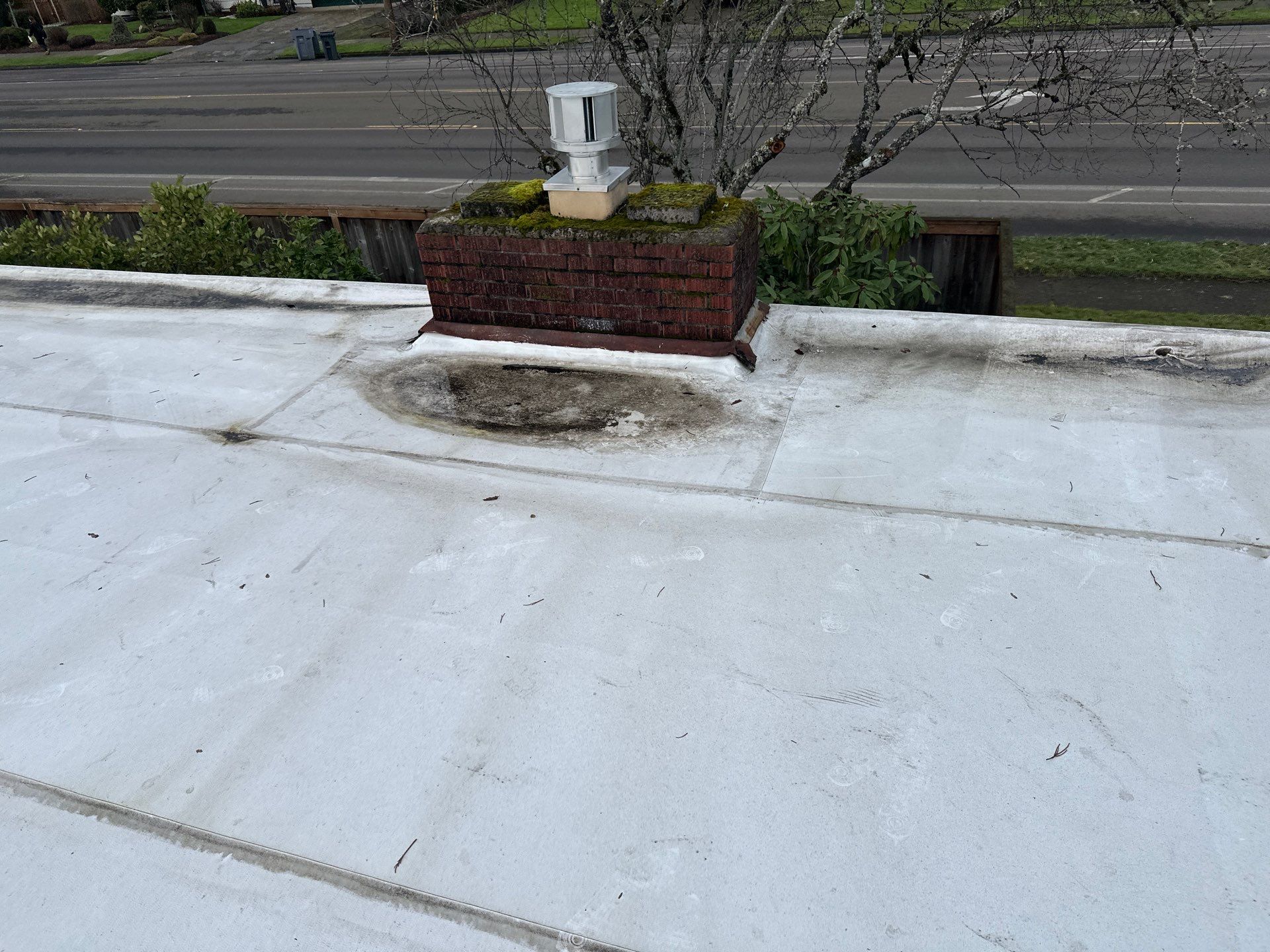 Residential Flat Roof Installation using GAF 60Mil TPO  by Orezona Building & Roofing Company, Inc.
