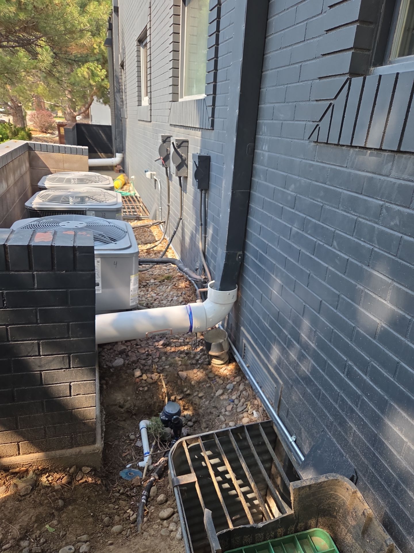 Custom Downspout Extension by RTP Roofing Company