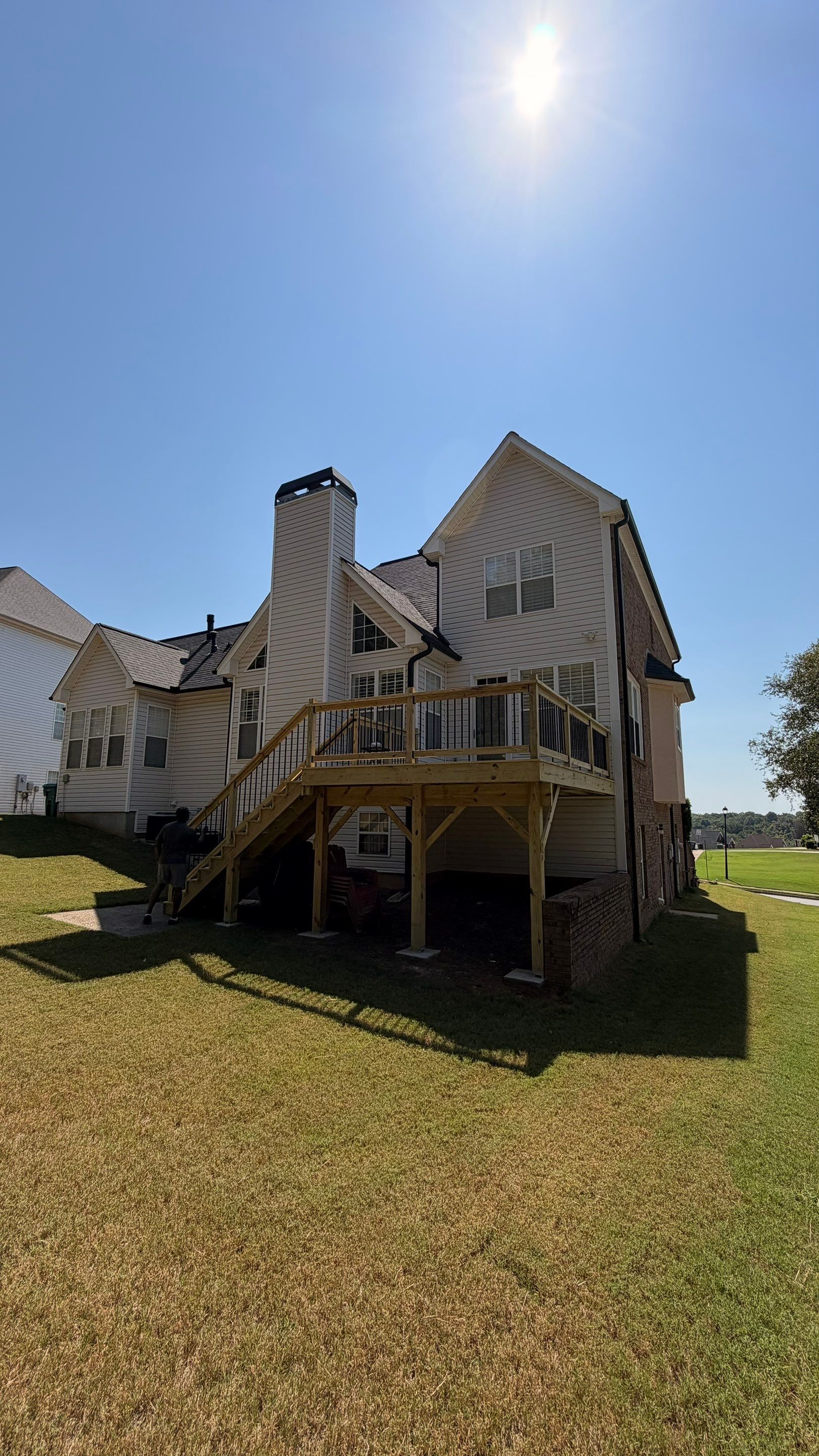 Elevated Pressure-Treated Deck and Staircase Rebuild in Douglasville by Swift Home Renovations