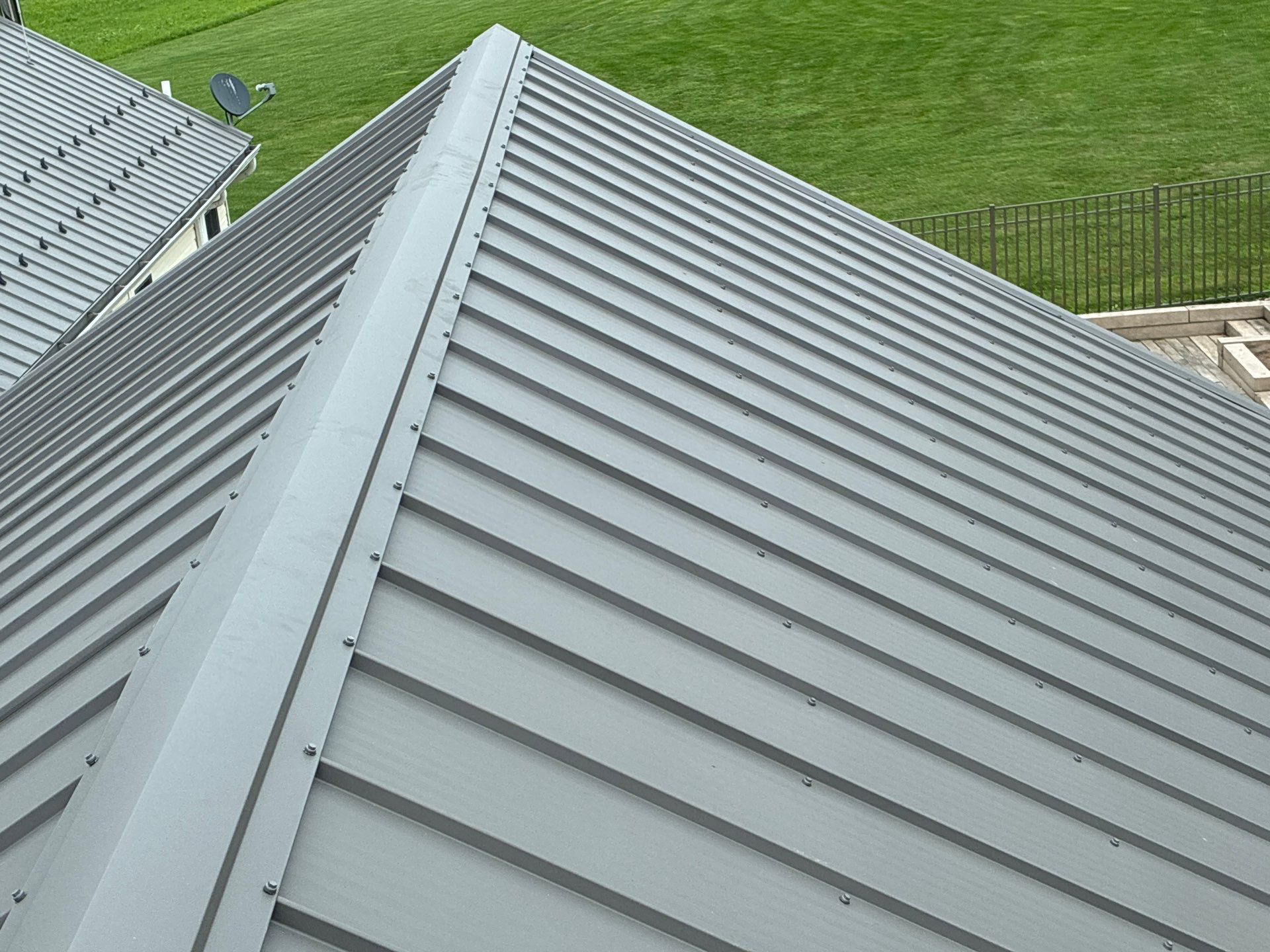 Newport Metal Roof Replacement with New Skylights by Esh Builders
