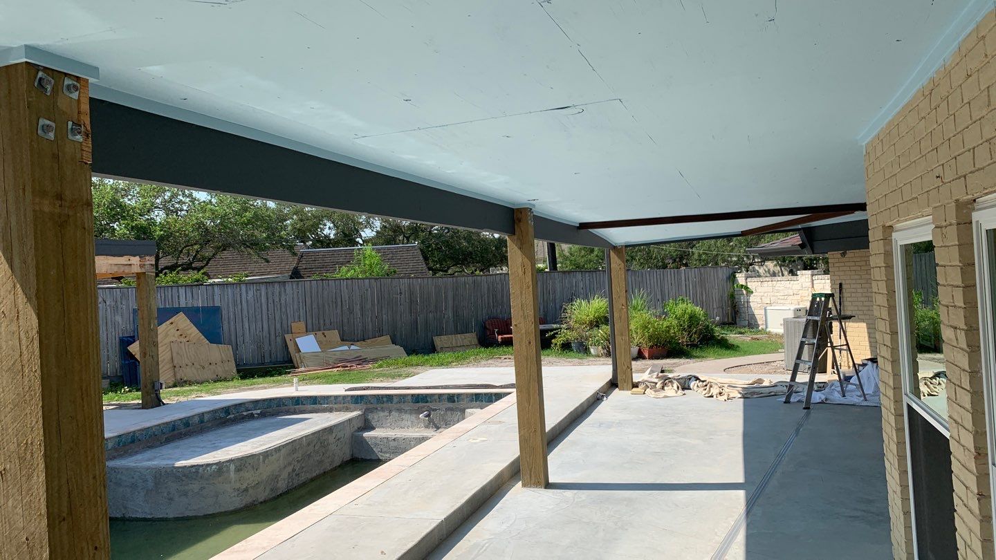 Beautiful pool side build by Bayfront Roofing and Construction