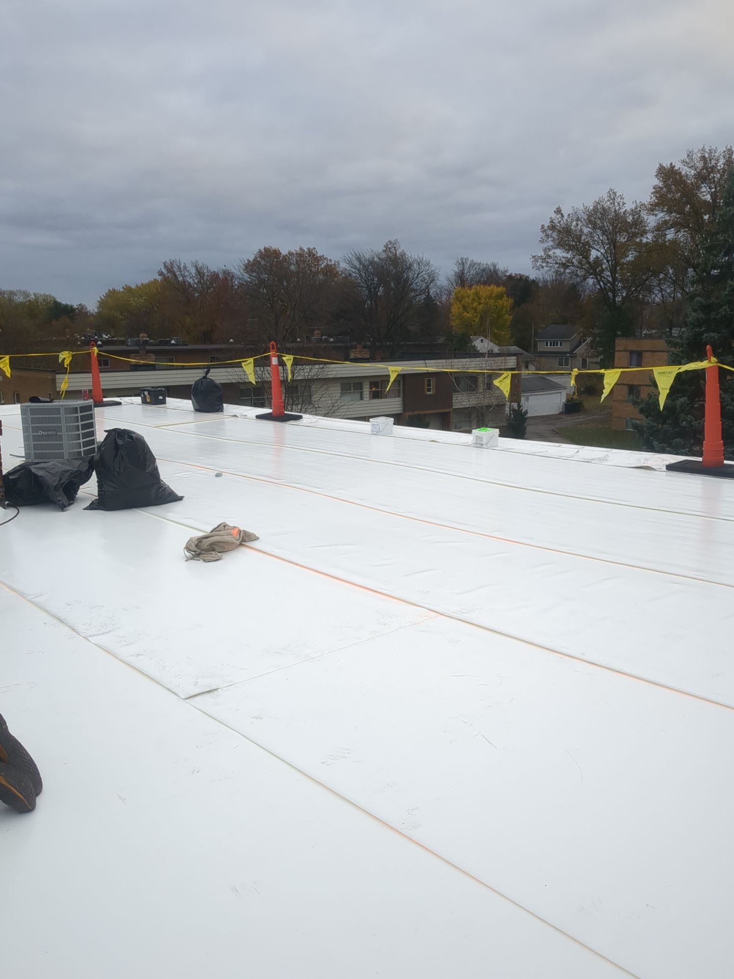 Commercial Roofing Installation using Duro-Last 50 mil PVC by 3 Daughters Construction 