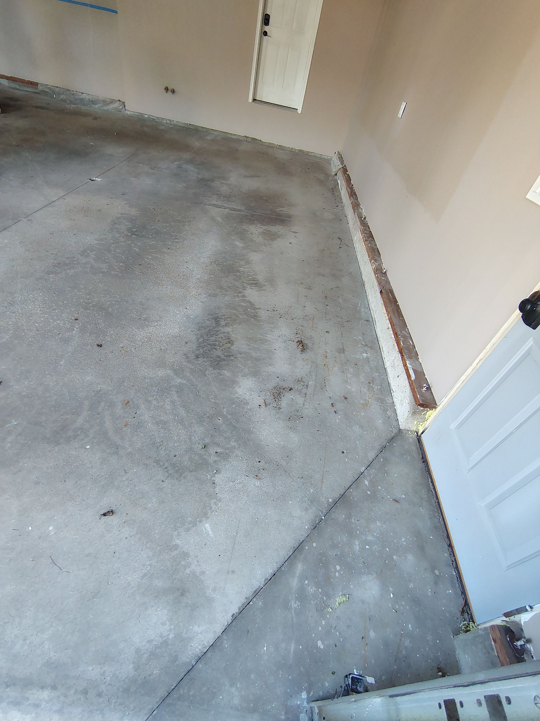 Sioux Falls Garage Concrete Repair and Epoxy Flake Floor Coating by Select Painting, Coatings & Garage Cabinets
