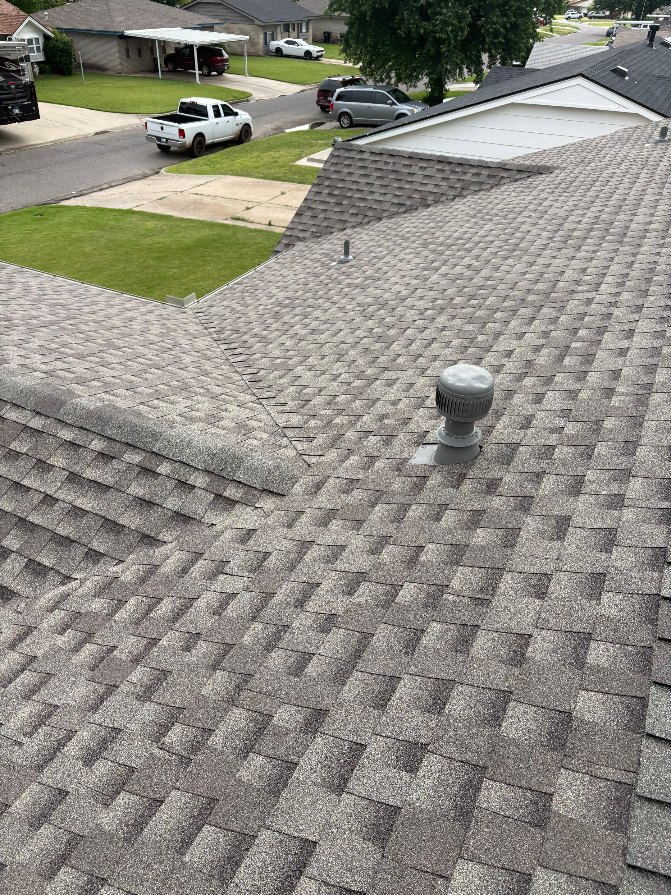 roof replacement & gutter installation in Moore by McCann's Roofing and Construction