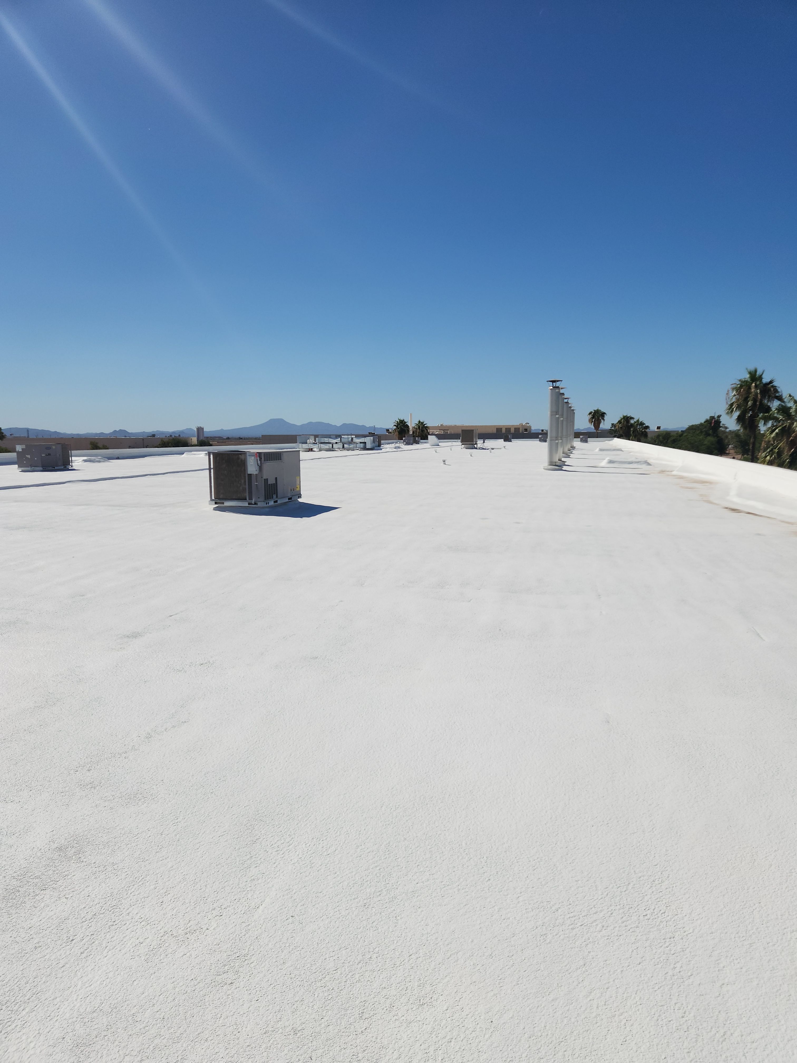 Spray foam roof and Henry's 400 coating  by Specialty Insulation AZ