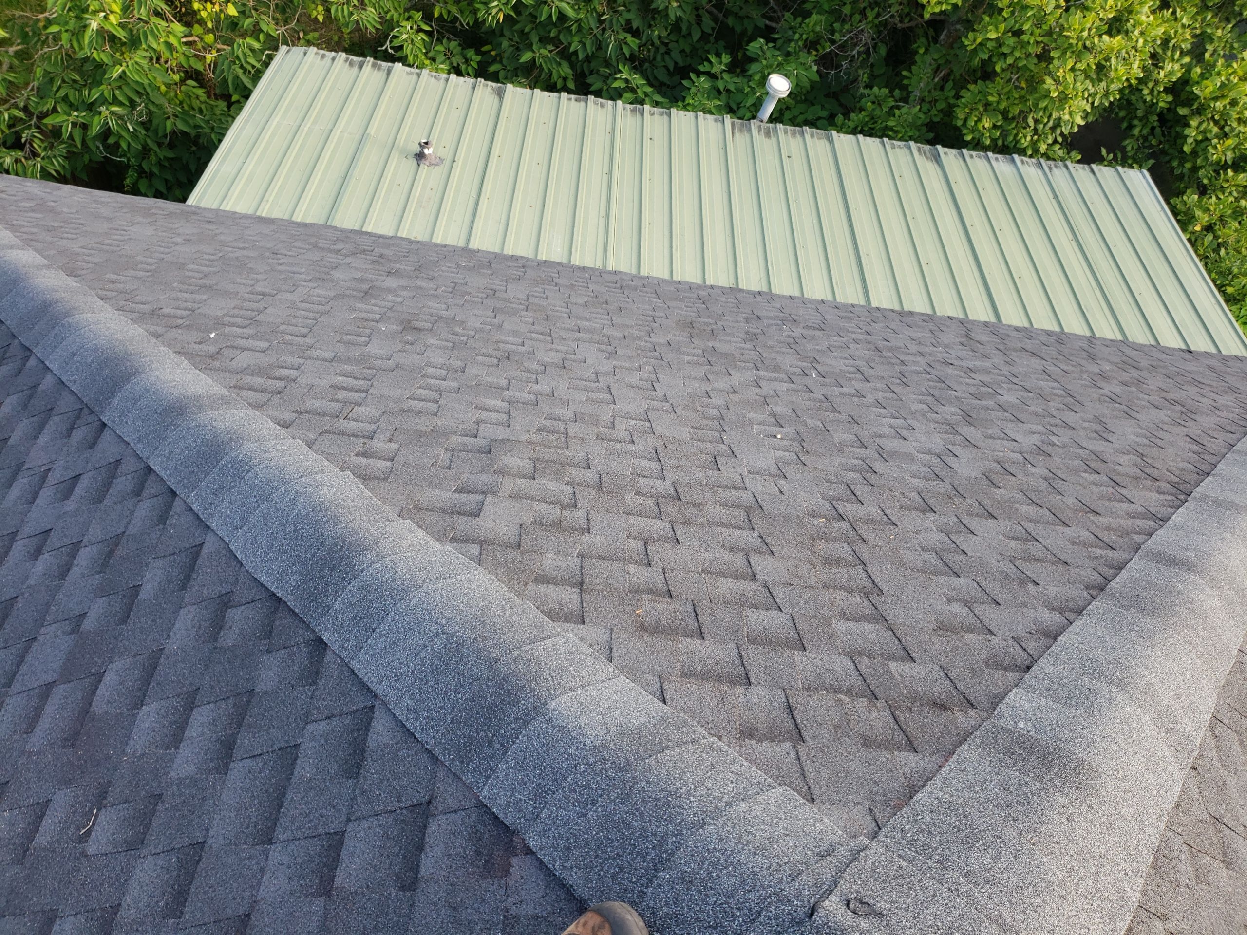 Residential Roofing Installation using Roof Replacement by American Roofing & Construction LLC