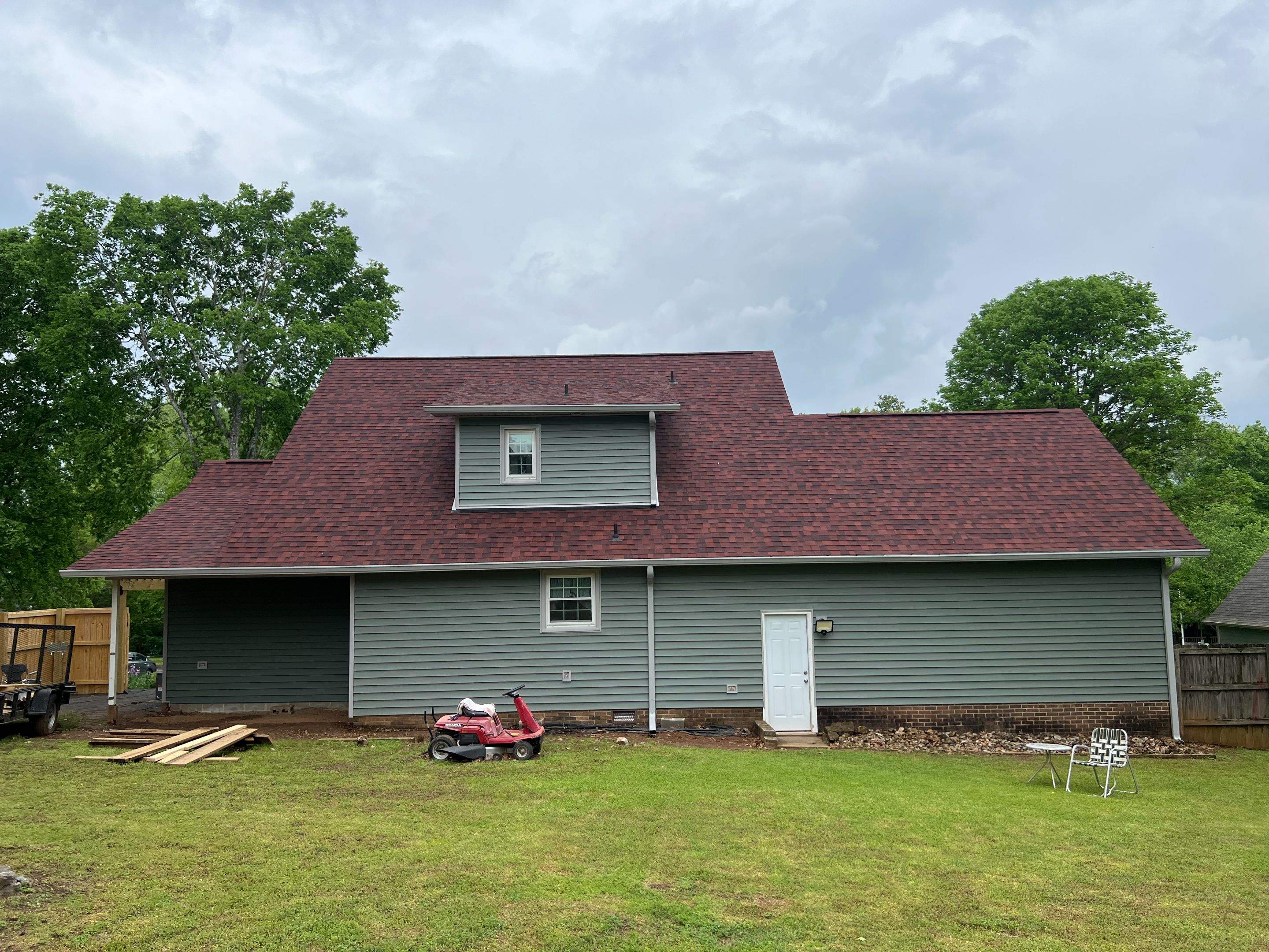 Siding Replacement using Mastic Carvedwood Vinyl Plank by Freedom Exteriors