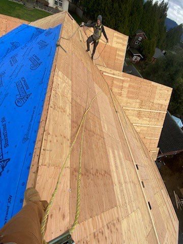 Residential Roofing Installation using Malarky Vista Midnight black by Top Notch Roofing Inc