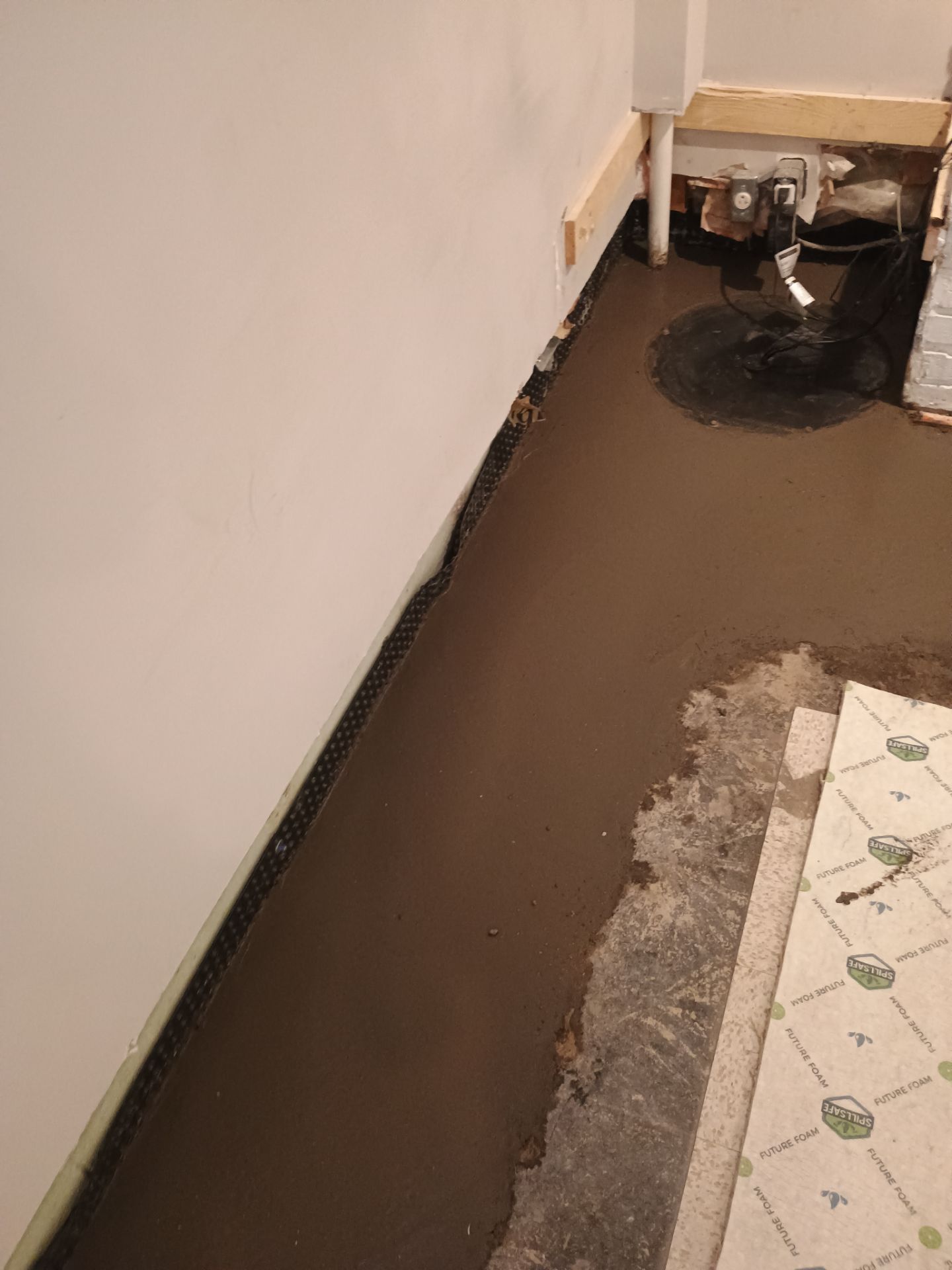 Interior Drain Tile & Sump Pump in Northwest Minneapolis by Waterproofing Northeast