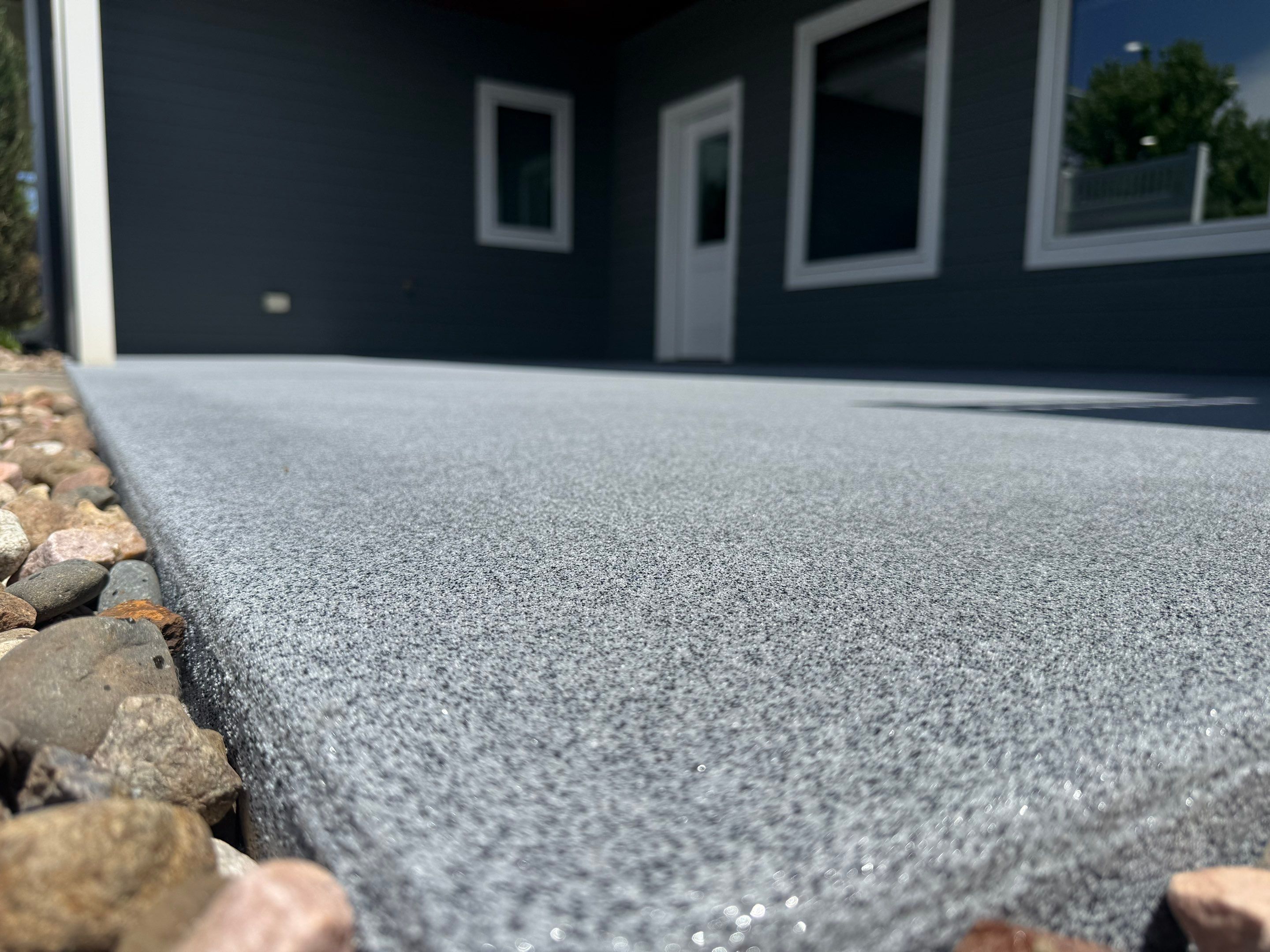 Polyurea Patio Floor Coating in Starry Evening for Sioux Falls Home by Select Painting, Coatings & Garage Cabinets