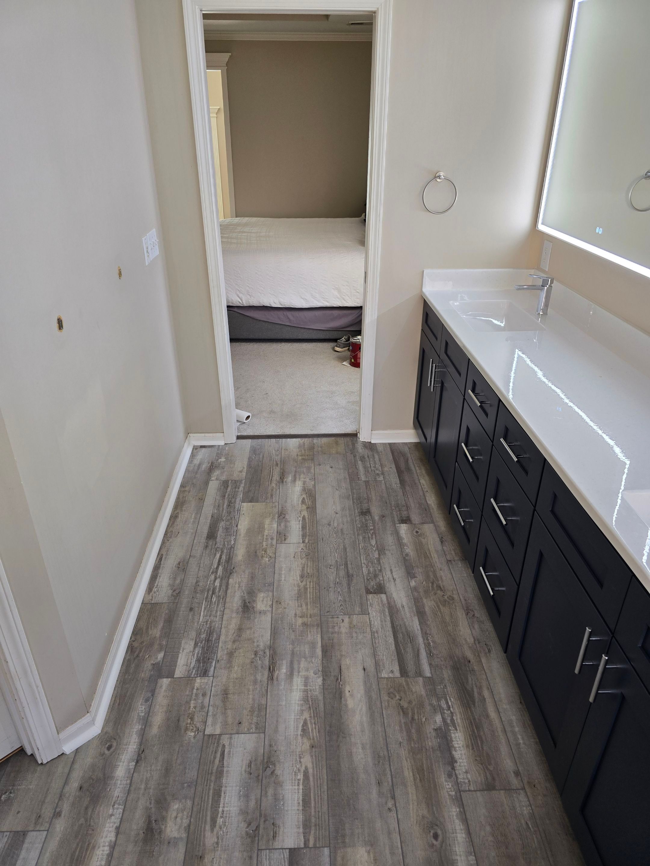 Full bathroom remodel with Artus lighted mirrors, Waltz bathtub and Mercury doors by The Shower Company