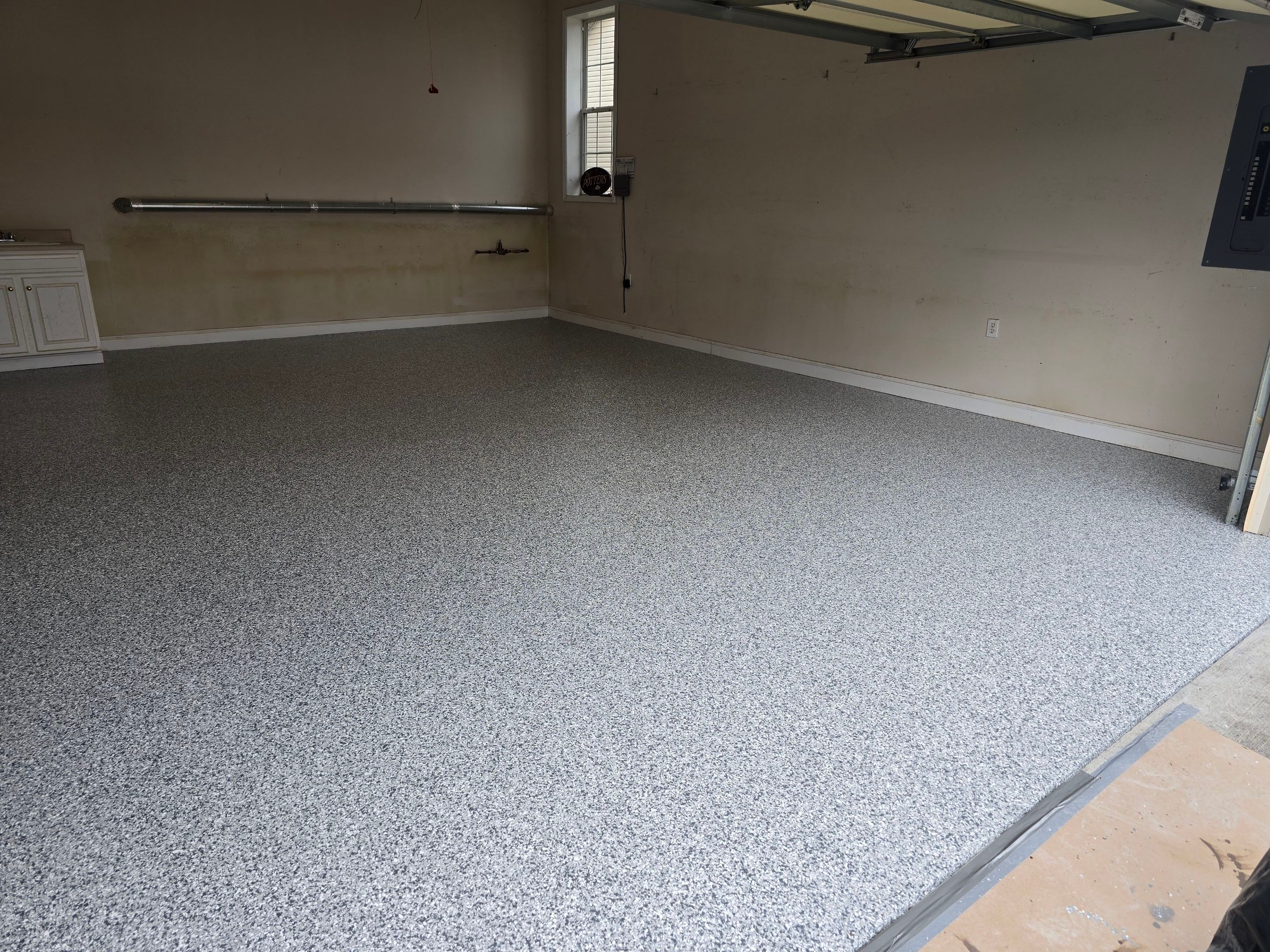 Garage using Gravel by Elite Floor Solutions