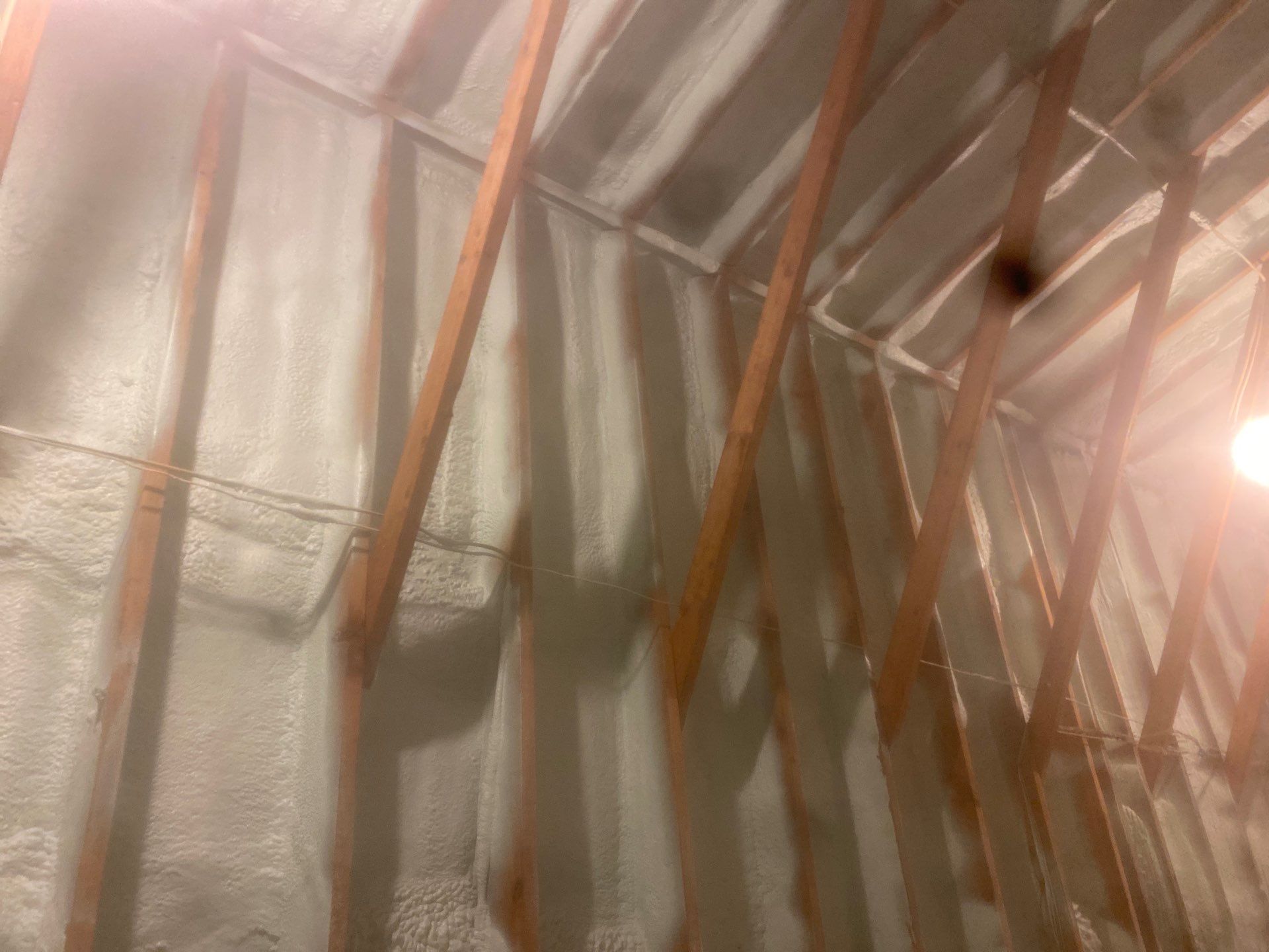 Attic Retrofit using open cell spray foam by NYS Foam & Energy