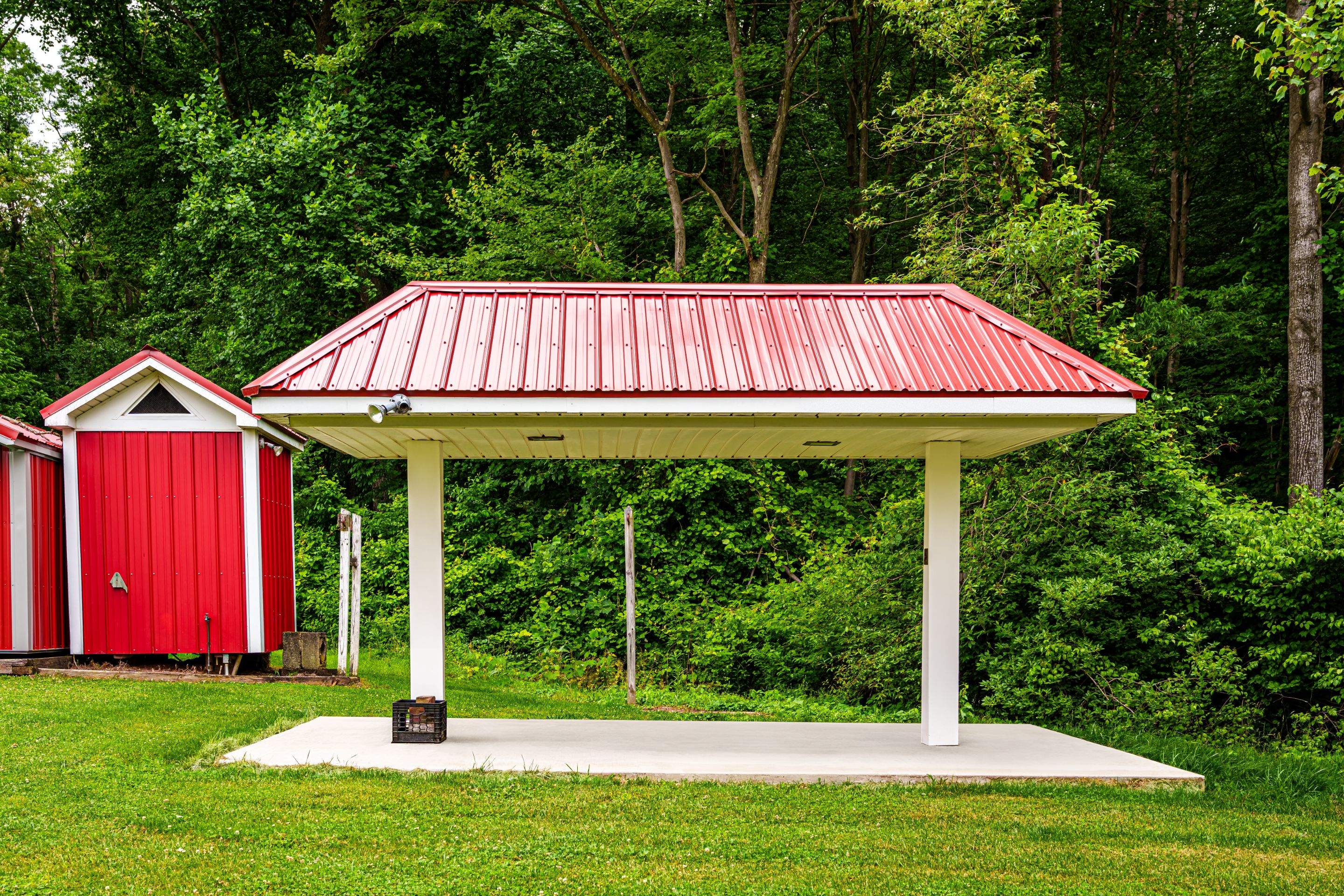 Metal roof -barn red, and New garage by Esh Builders