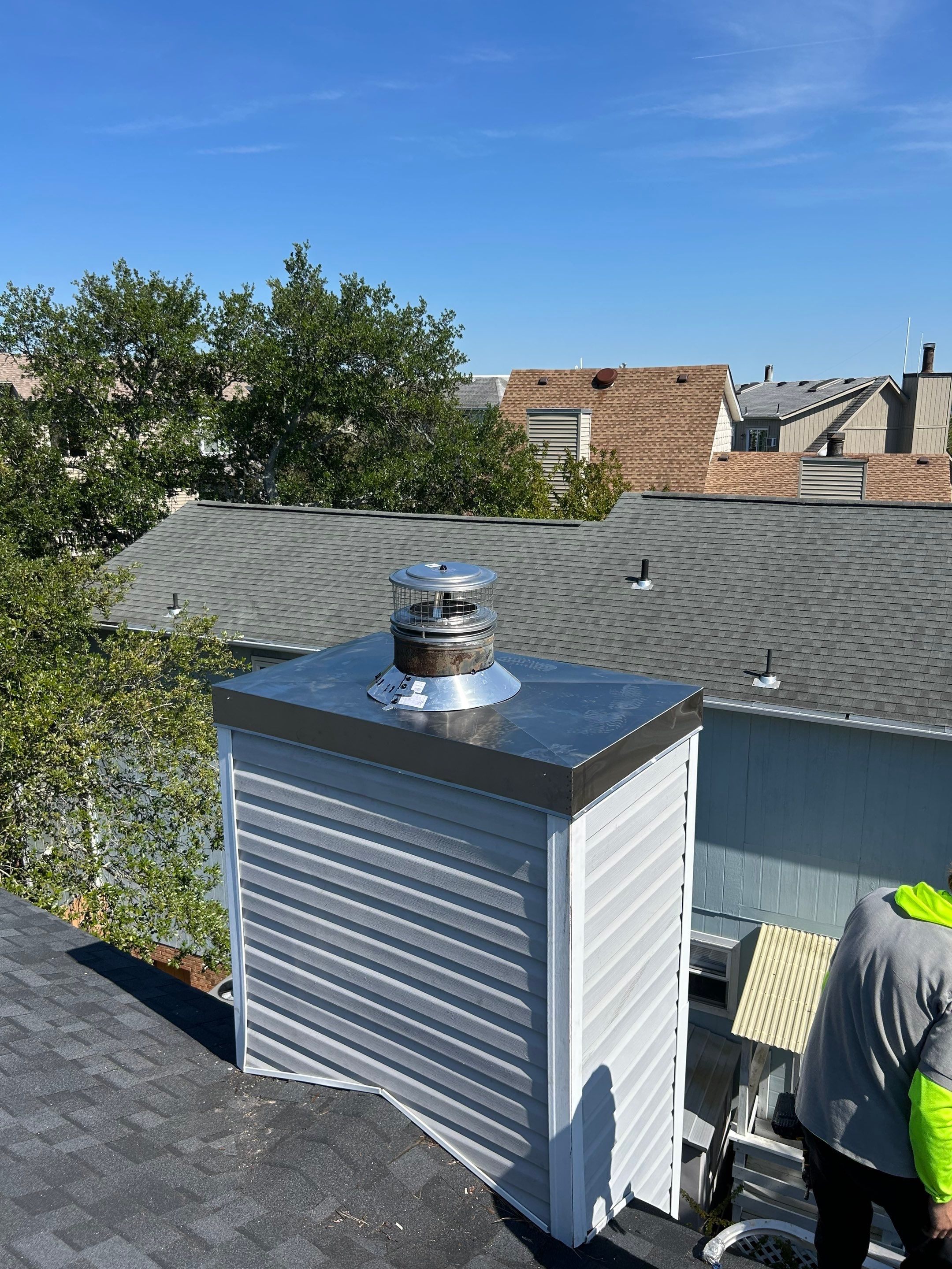 Chimney Leak Repair - Chase Cover, Cap, and Siding by Premier Chimney and Roofing