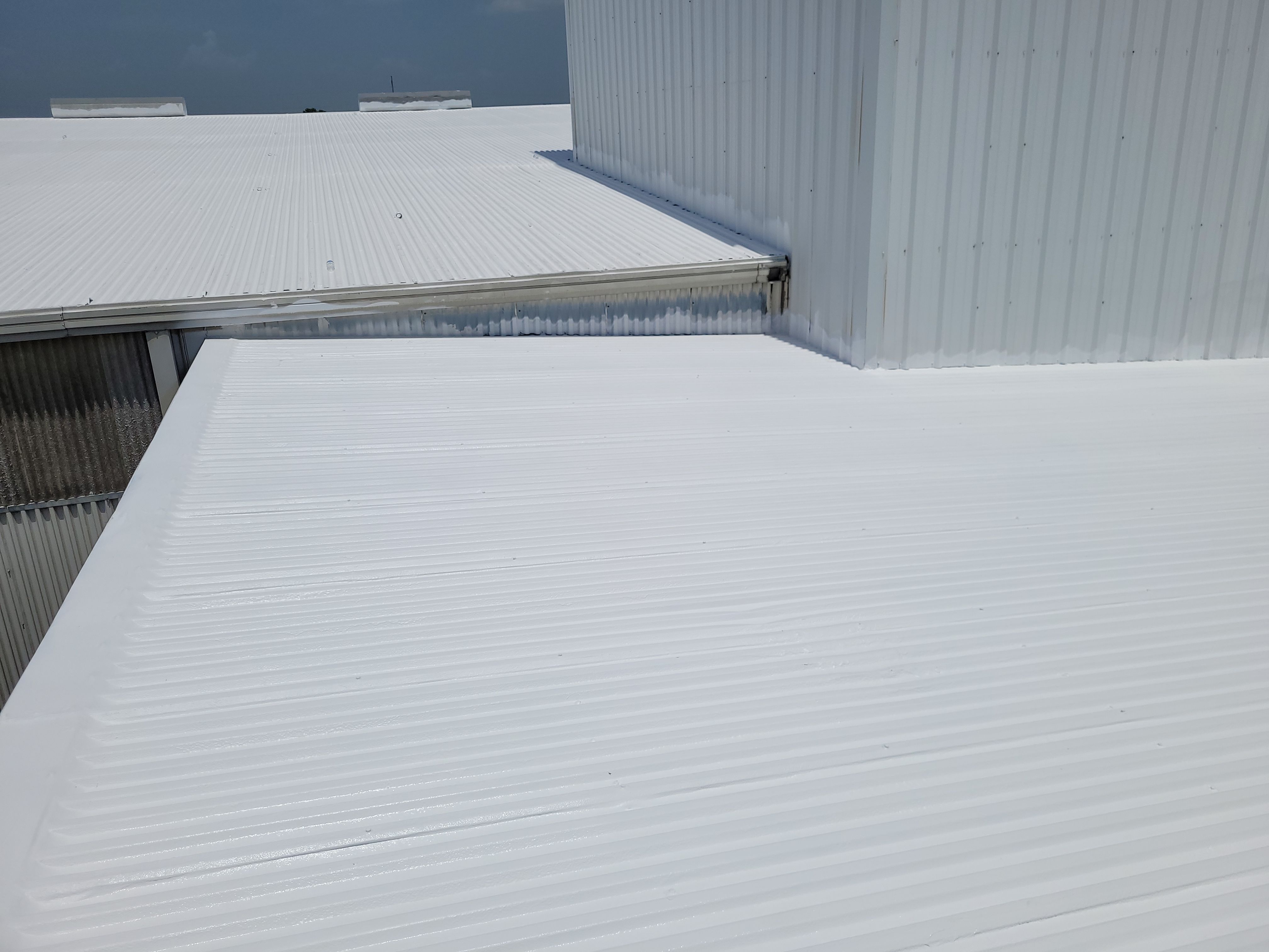 Commercial Metal Restoration System using Aldocoat Coatings by Hostetler Roofing