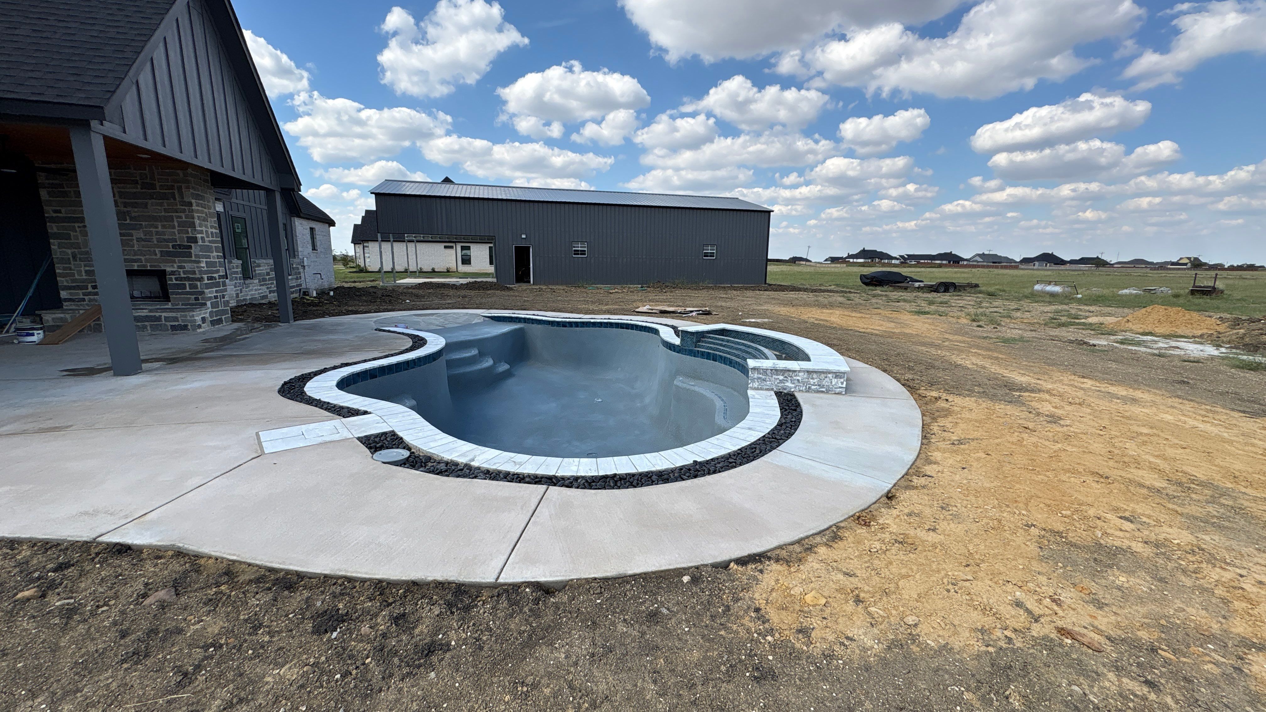 Large Freeform Pool with Beach Entry by Pinnacle Pools and Spas - DFW