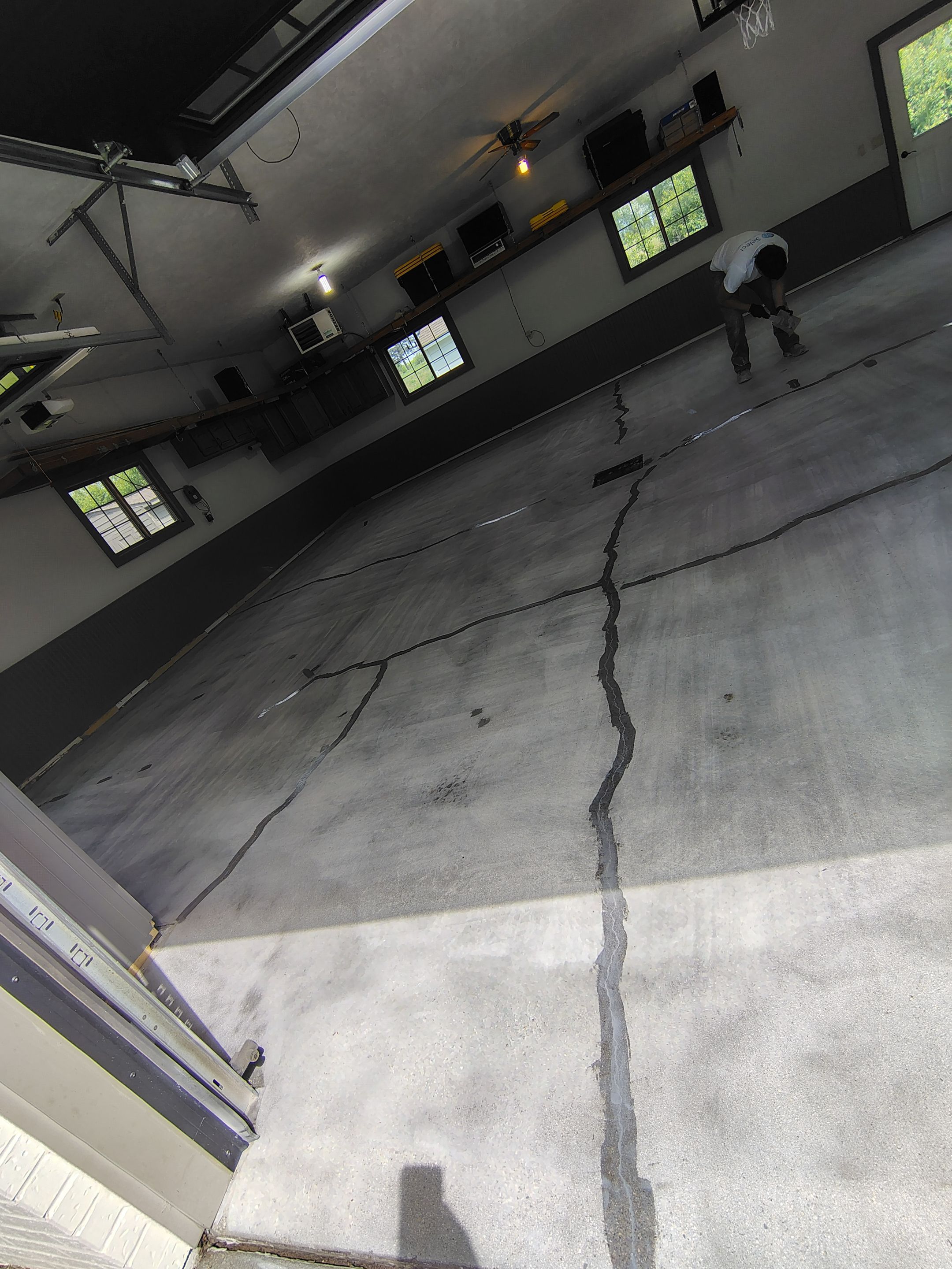 Multi-Fleck Epoxy Garage Floor Coating in Dell Rapids by Select Painting, Coatings & Garage Cabinets