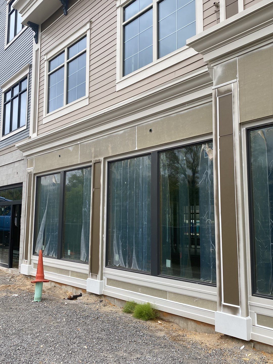 Ada House Hotel Exterior Remodel by Cutting Edge Homes