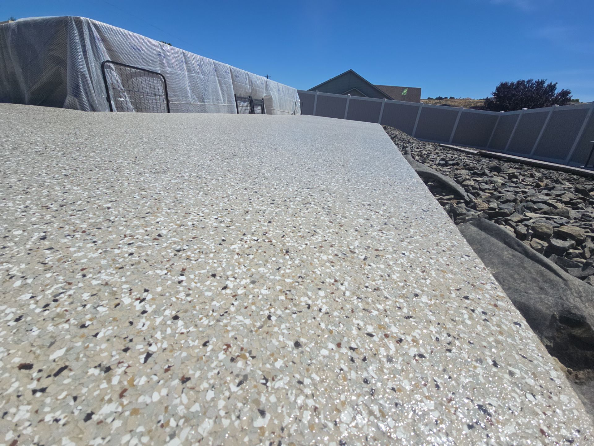 Pebble Beach Flake Coating for Kennewick Pool Deck and Patio by Croc Coatings, LLC