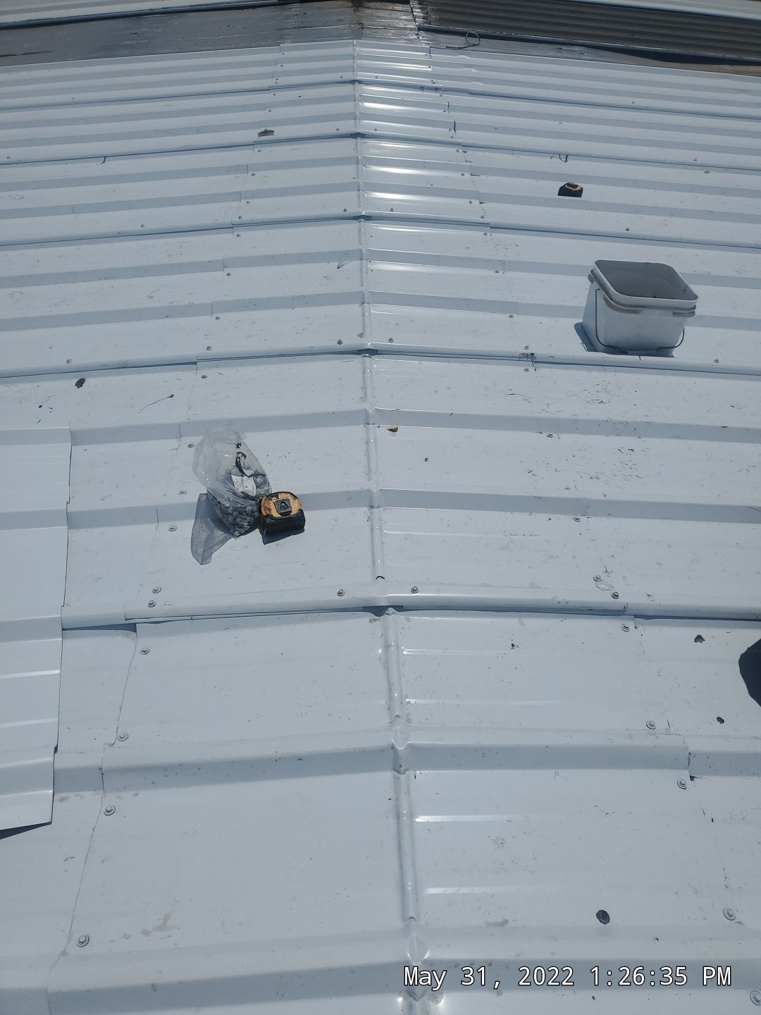 Commercial Roofing Installation using Aluminum Roofing panels by Hostetler Roofing
