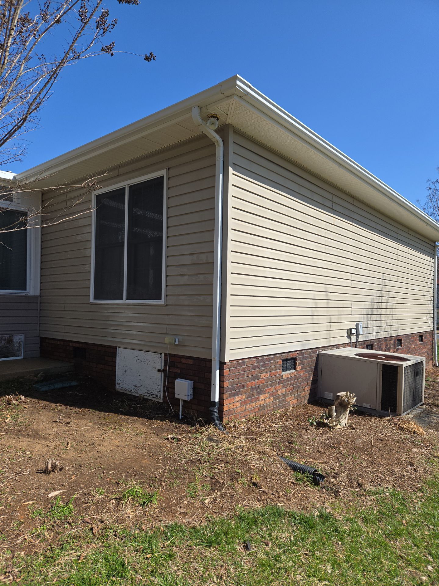 House Wash using cleaner by Power Wash Masters LLC
