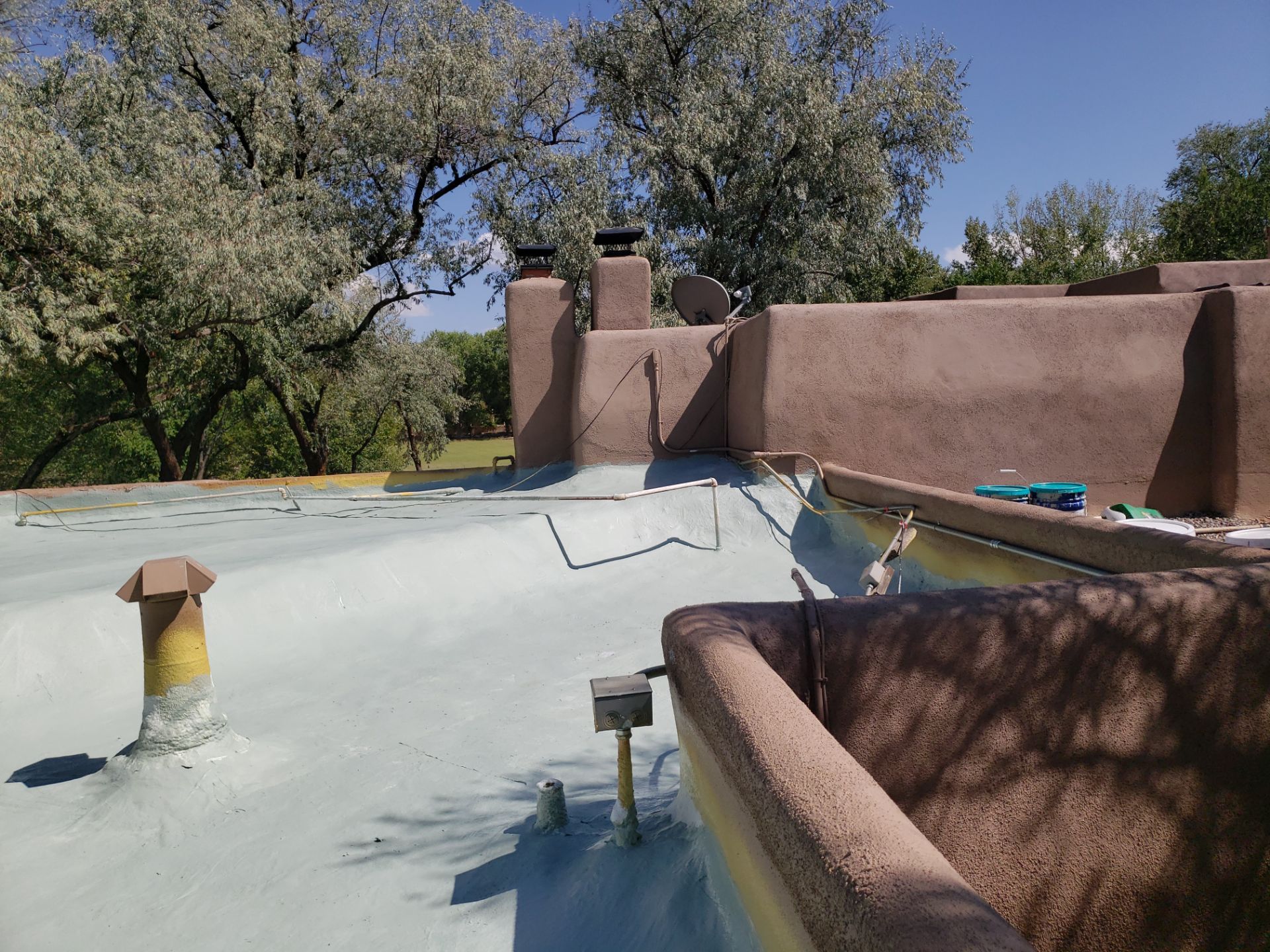 Residential roof application by SPF Services 