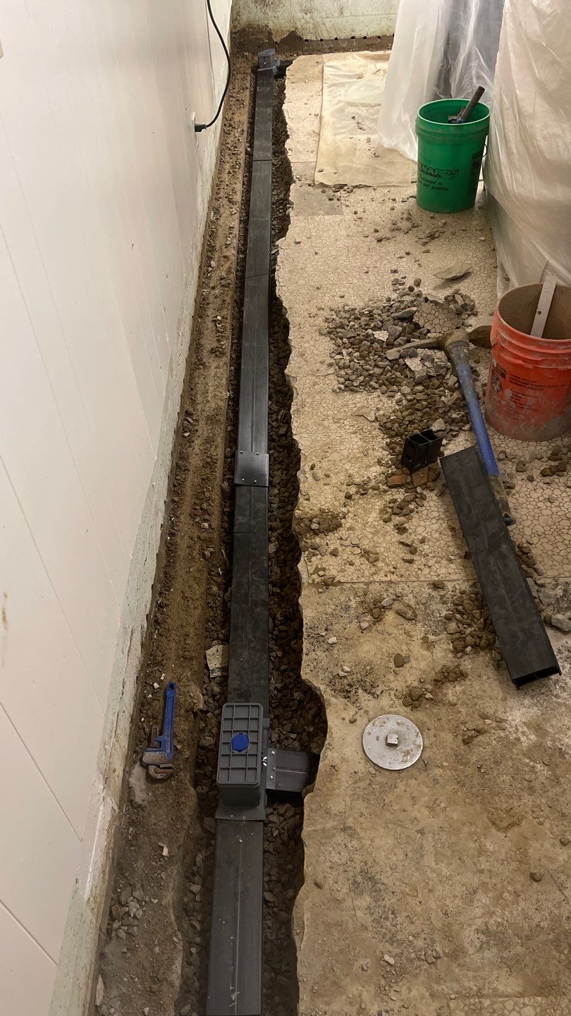Interior Waterproofing Using GrateDrain™ Products by Toledo Basement Repair