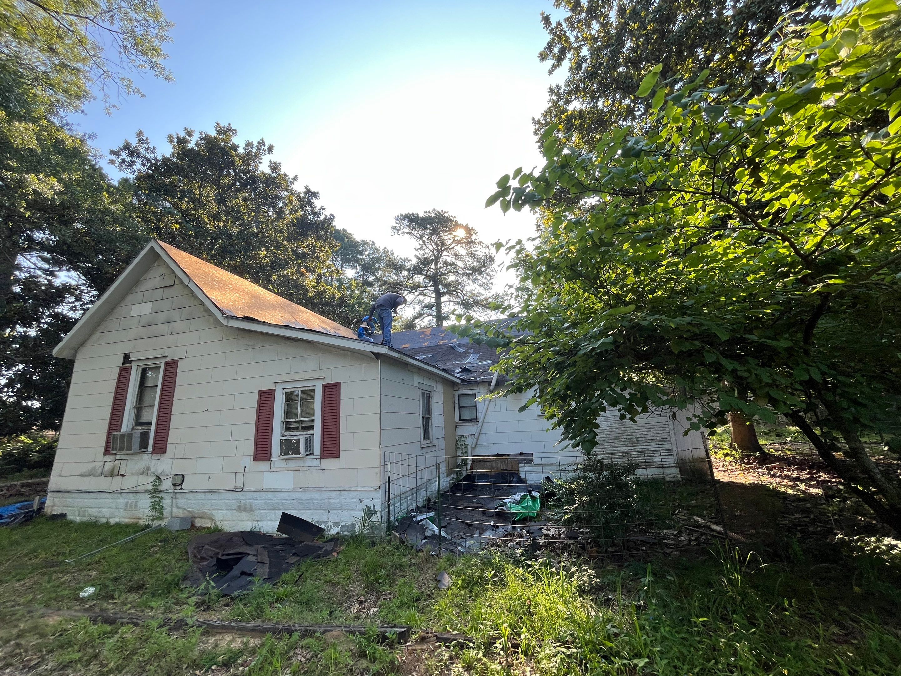 Storm Restoration Reroof: 25 Year 3-Tab Shingle by Hostetler Roofing