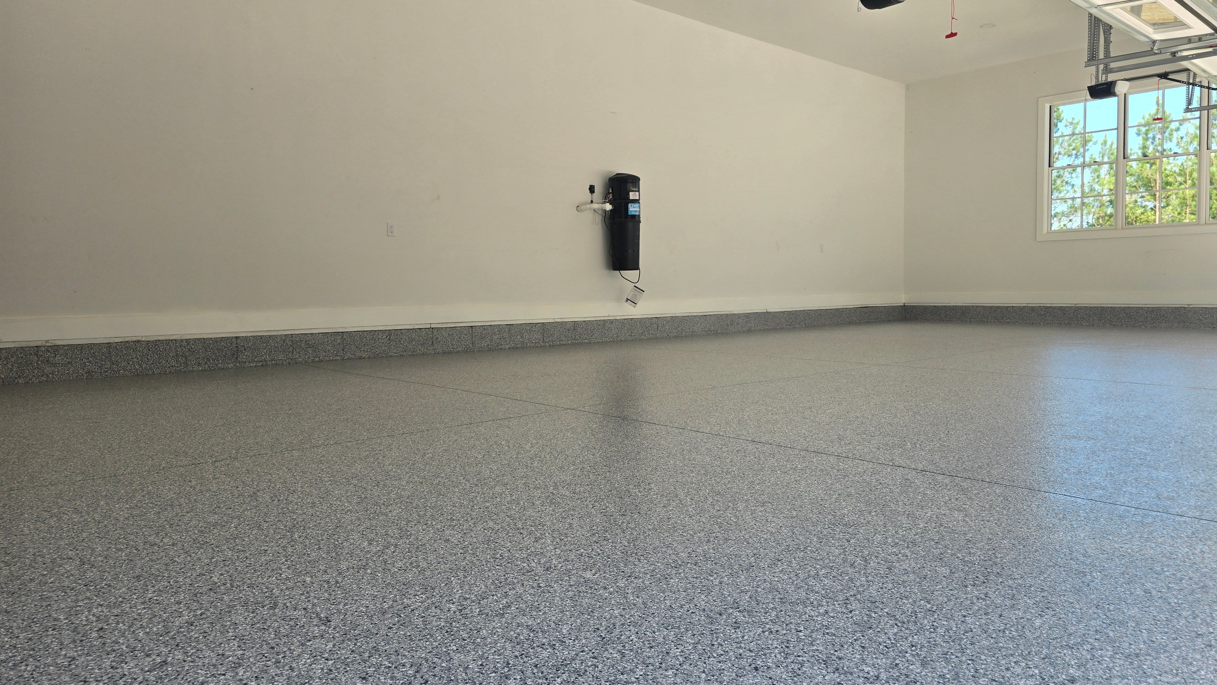 Porch & Garage Using Tidal Wave & Gravel  by Elite Floor Solutions