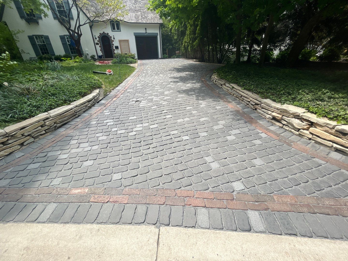 Glencoe, IL brick paver clean sand seal, repair, and reseal by Northern Power Washing LLC.