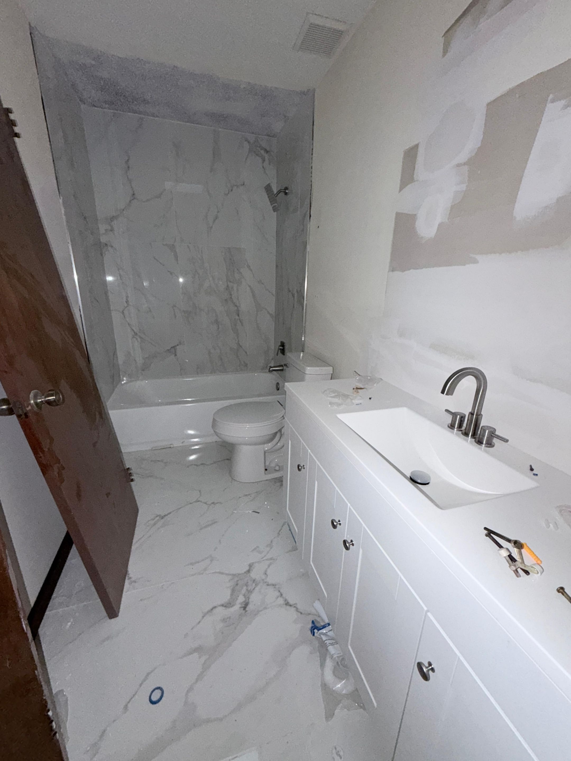 Full Home Flooring & 2-Bathroom Renovation by urban green energy llc