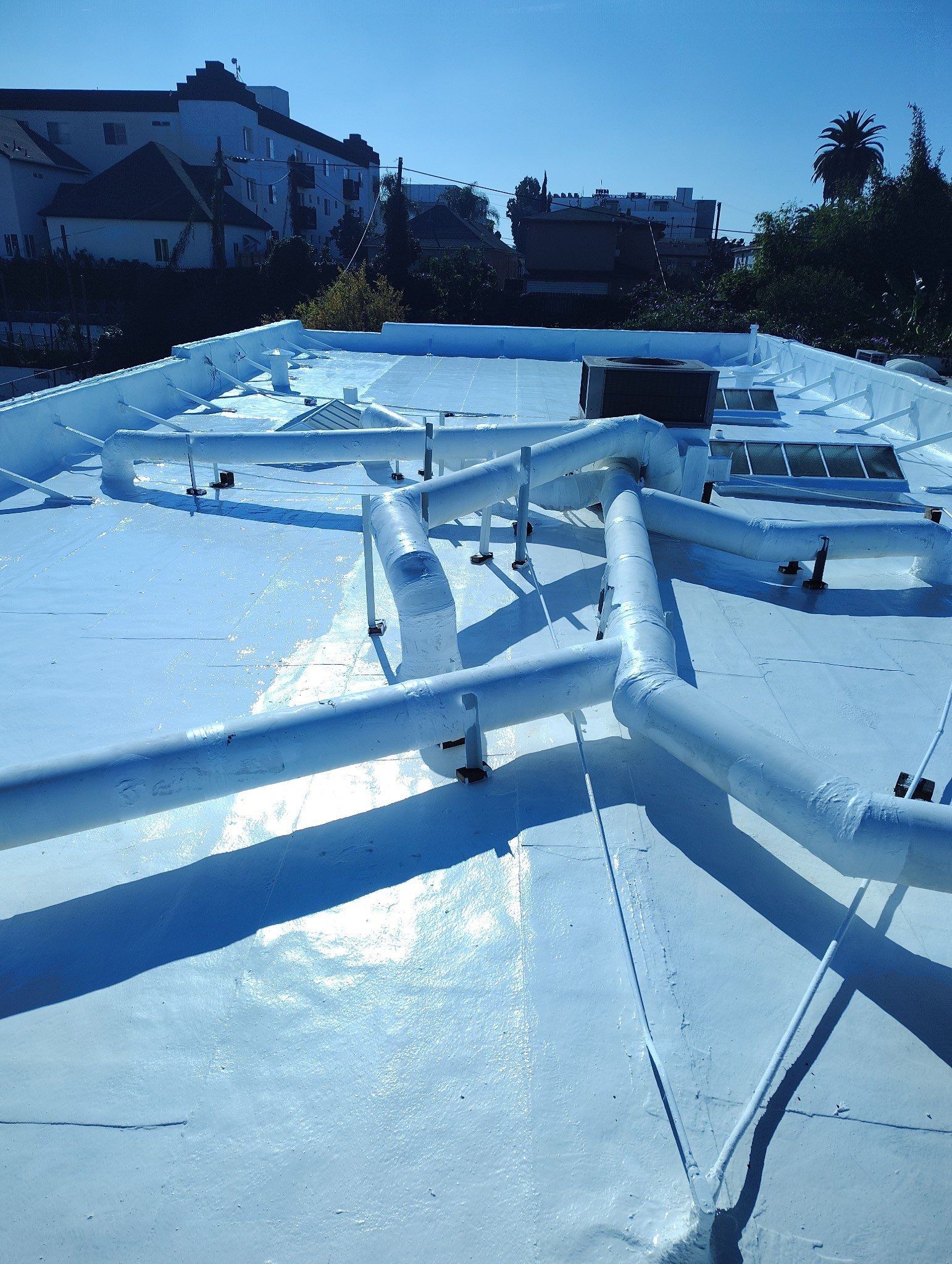 Commercial Roofing Installation using ASC Silicone Membrane by Hull Brothers Roofing