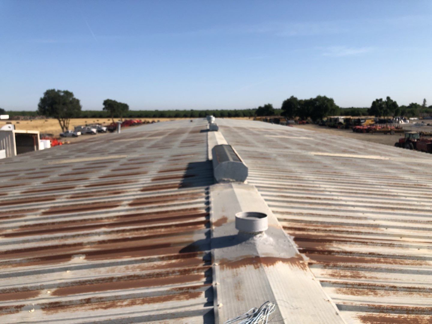 Spray foam and coatings using Conklin Benchmark/PUMA XL coatings and spray foam by Straight Edge Roofing Inc