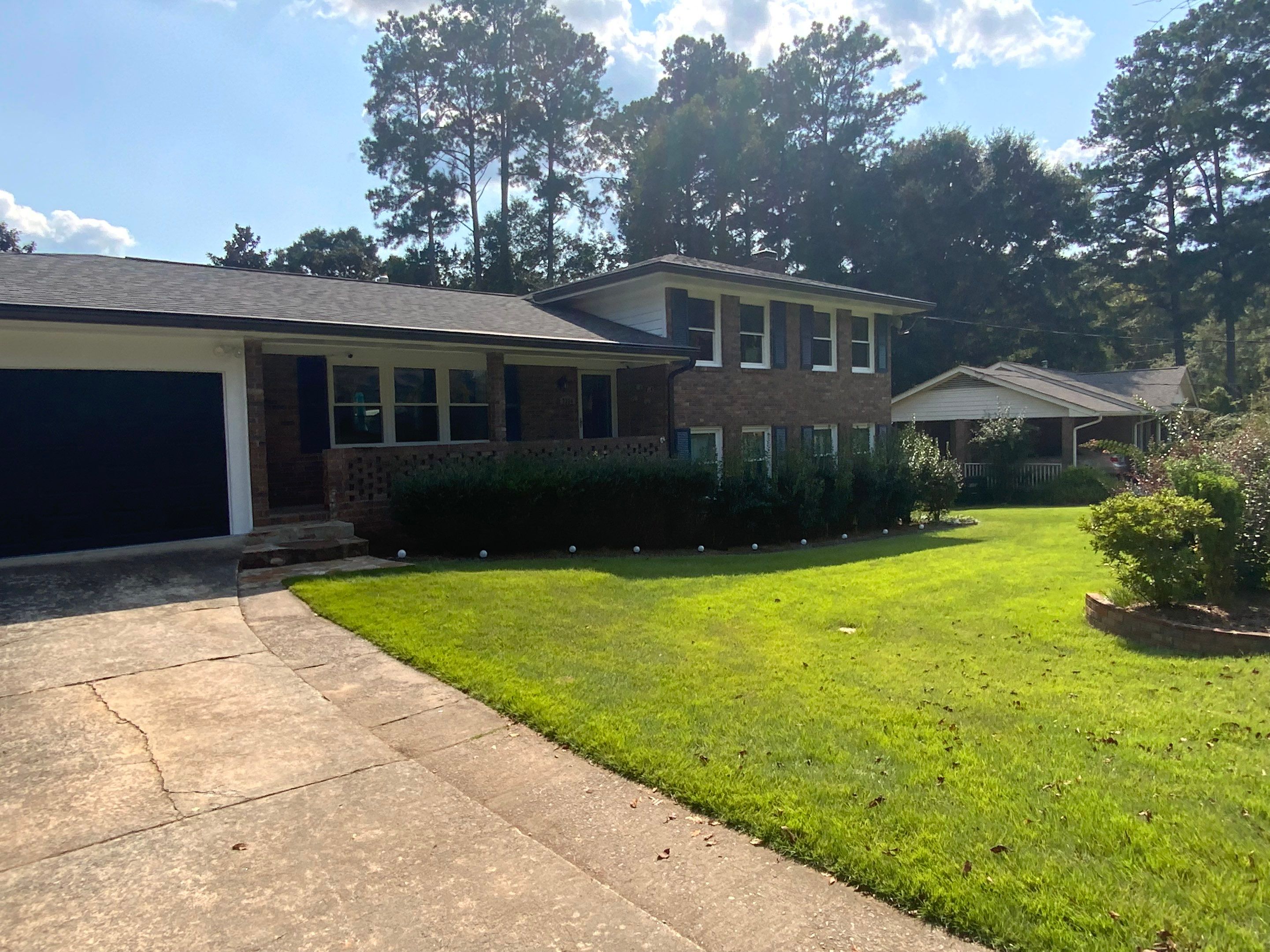 Full Exterior Trim Painting and Multi-Level Deck Staining by Swift Home Renovations