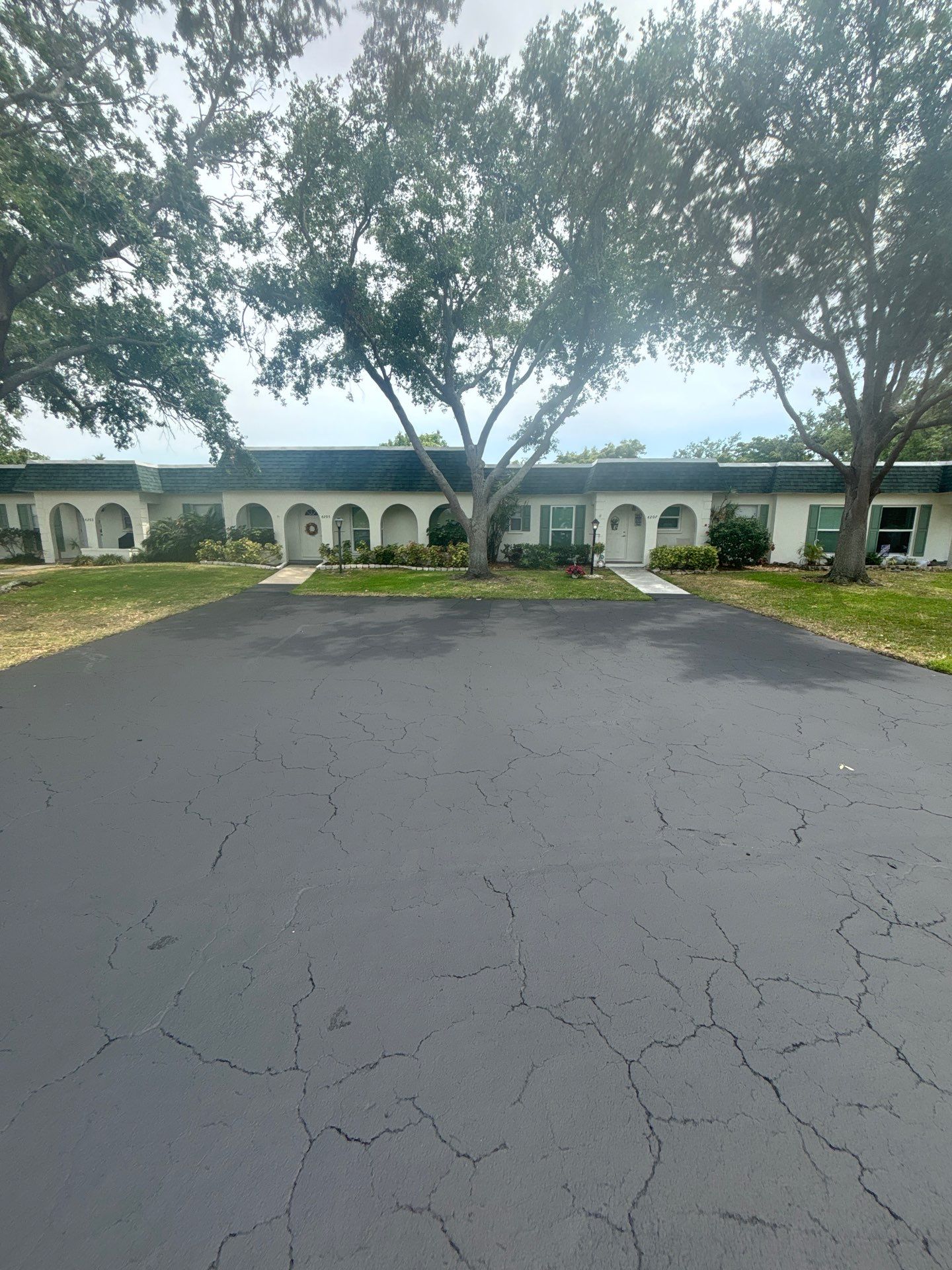 Sealcoating, Asphalt Repair, Crack Sealing, Line Striping at Cortez Villas Condo Association by Everline Coatings & Services - Southwest FL