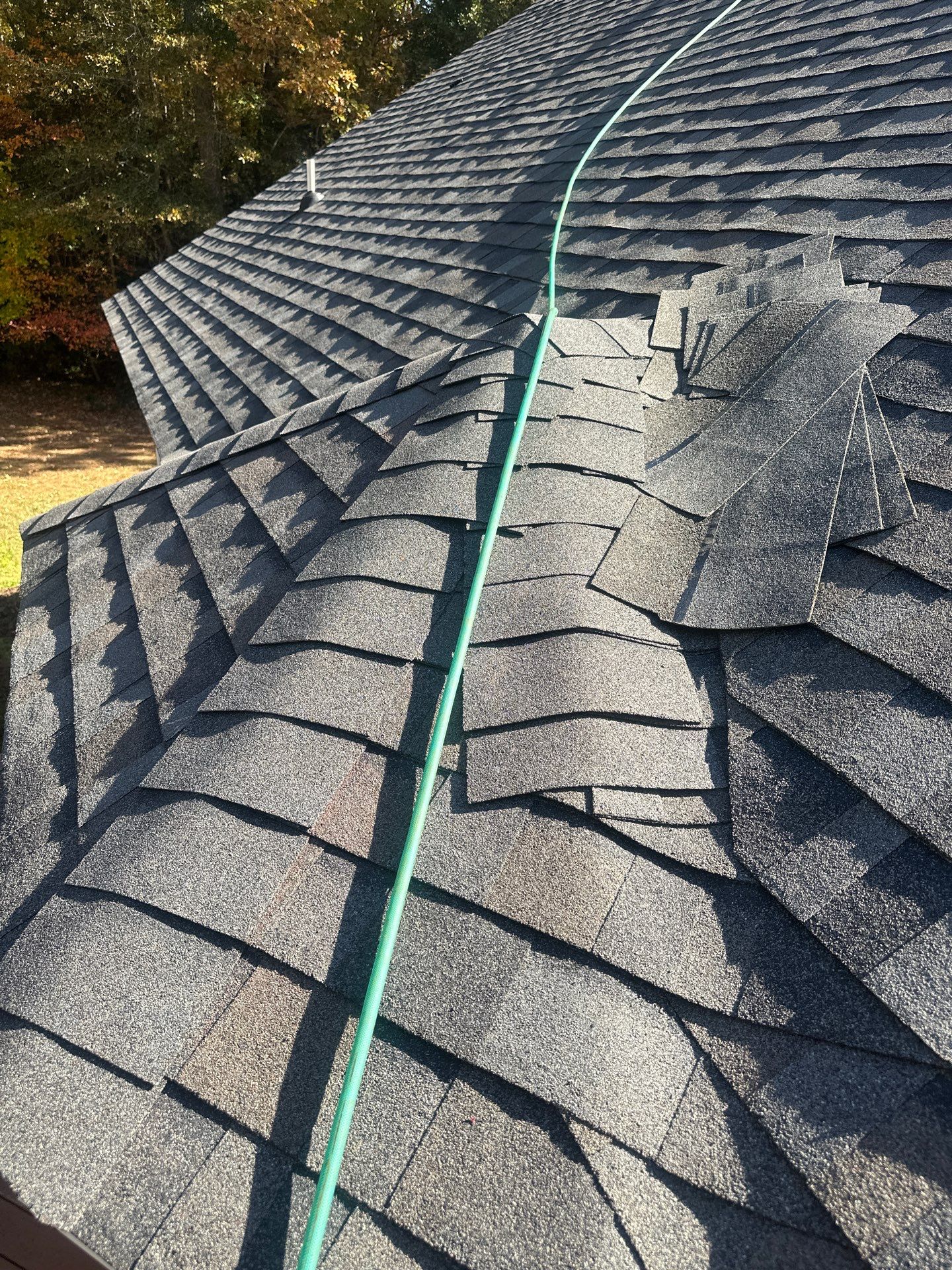 Mathews Residential Roof Replacement Using Owens Corning Duration Shingles by Cade Construction