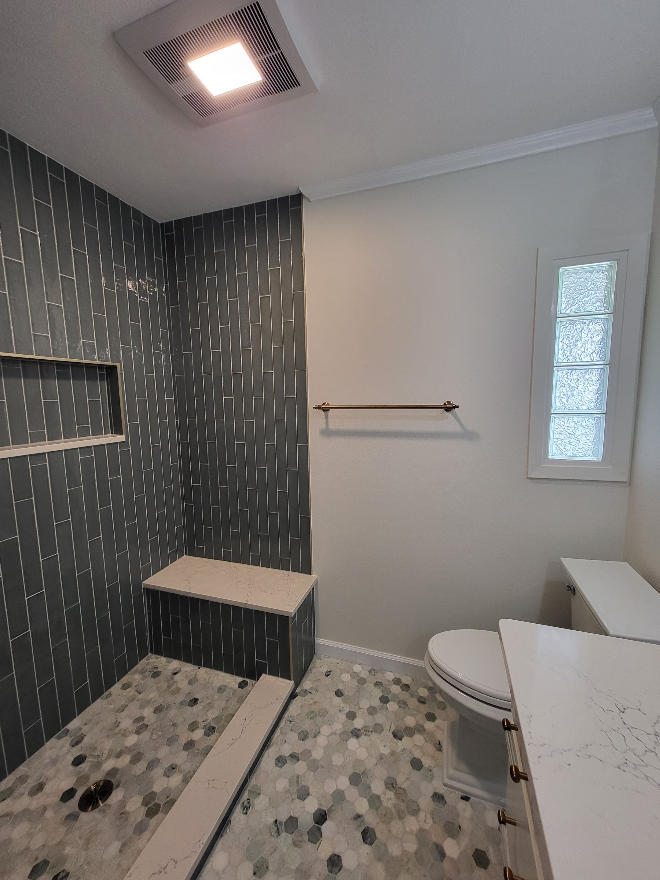 Northwood Bathroom Remodel with Vertical Stack Tile Shower by Legacy Bath and Kitchen
