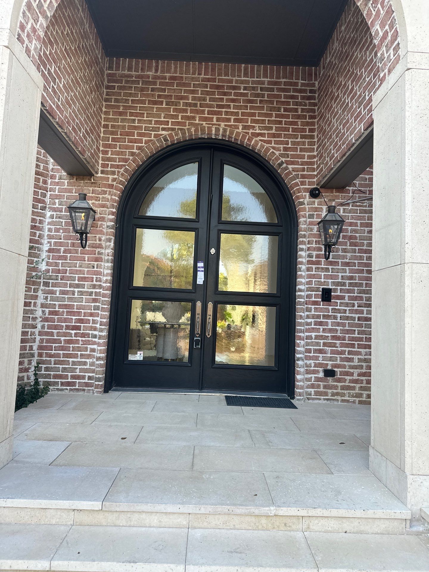 Custom Arched Metal Entry Door Installation in Plano by Solara Custom Living