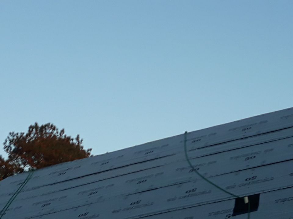 Residential Roofing Installation using Roof Replacement by American Roofing & Construction LLC