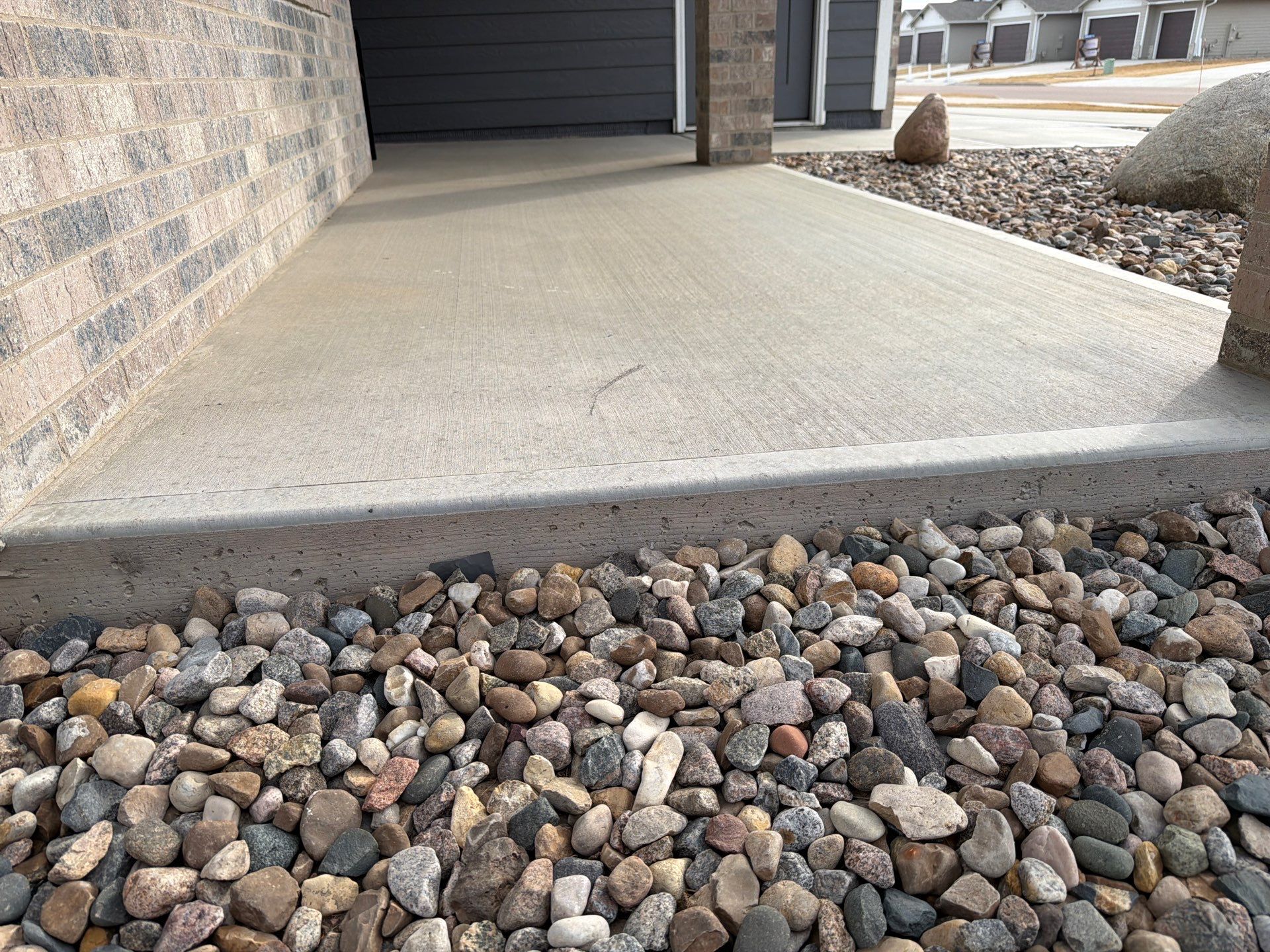 Decorative Flake Concrete Coating for Sioux Falls Porch and Patio by Select Painting, Coatings & Garage Cabinets
